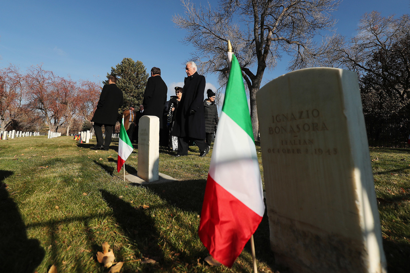Gov. Gary Herbert and Elder Dieter F. Uchtdorf, of The Church of Jesus Christ of Latter-day Saints’ Quorum of the Twelve Apostles, walks through graves during the German Day of Remembrance (Volkstrauertag) at Fort Douglas Military Cemetery in Salt Lake City on Sunday, Nov. 18, 2018. (Photo: Jeffrey D. Allred, KSL)