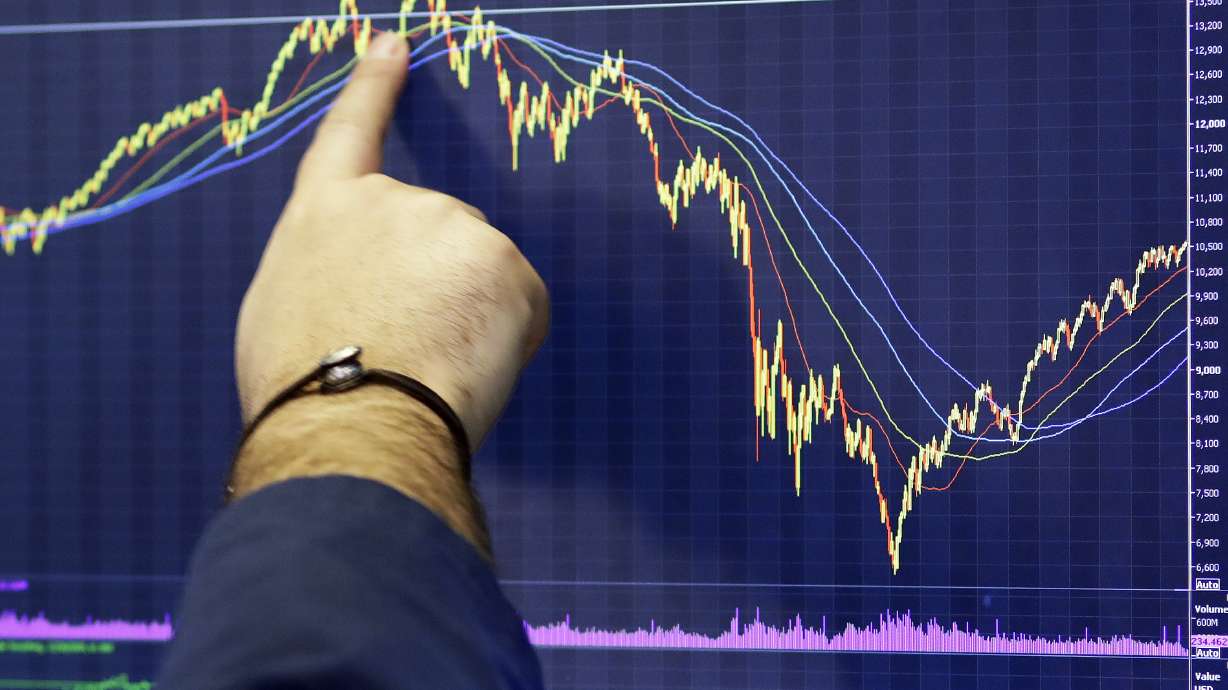 Global stocks slide as futures point to Wall Street drop