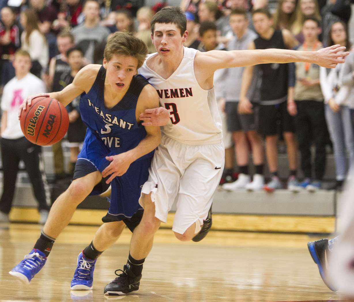 Pleasant Grove's Casey Brown, left, drives against American Fork's Dallin Hucks, right, in the second half of action Tuesday, Feb. 16, 2016 at American Fork High School. (Photo: Luke Franke, Deseret News)