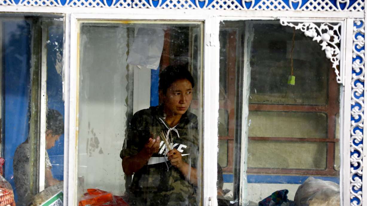 China's model village of ethnic unity shows cracks in facade