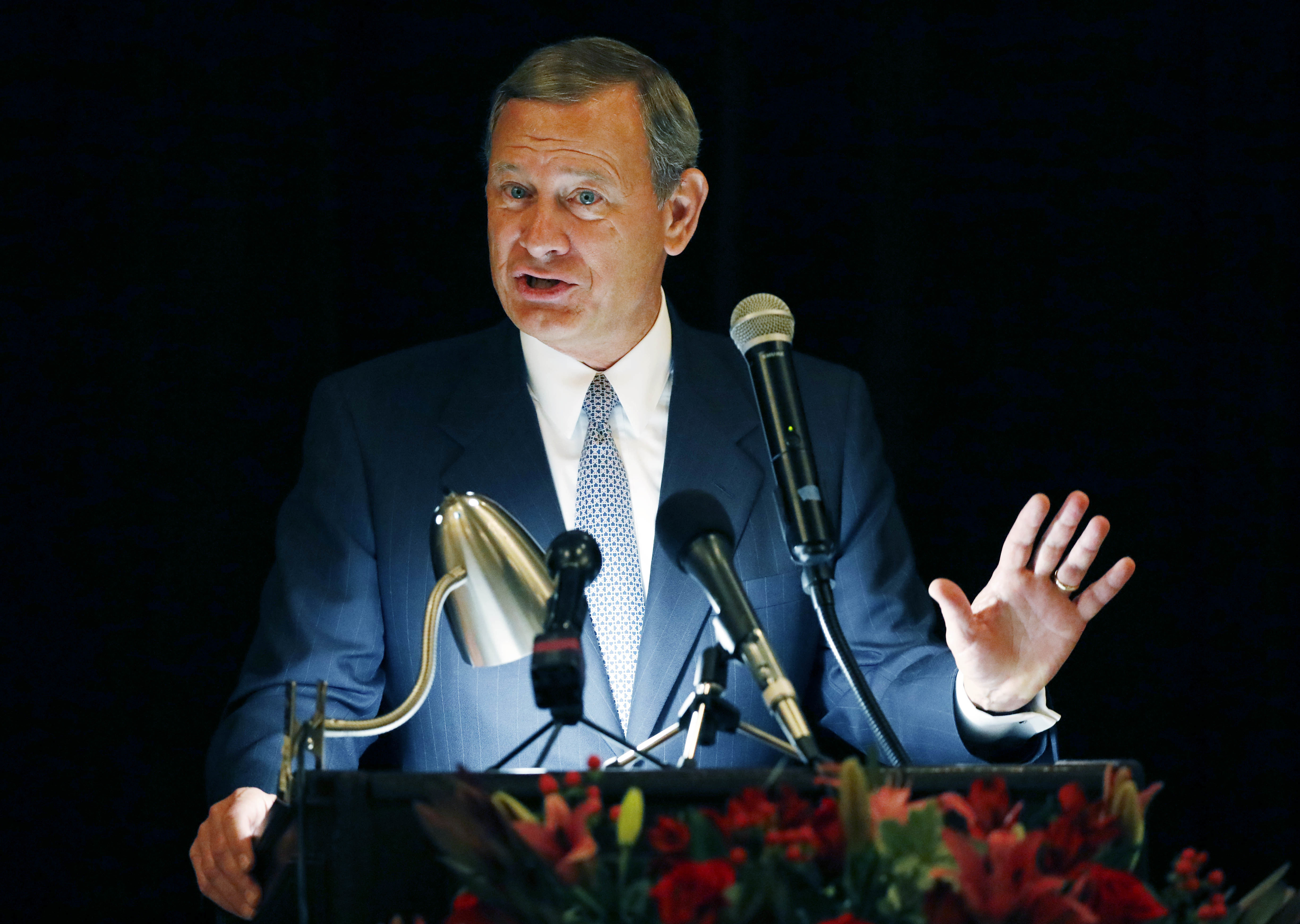 The Latest: Trump, Roberts clash over judiciary independence