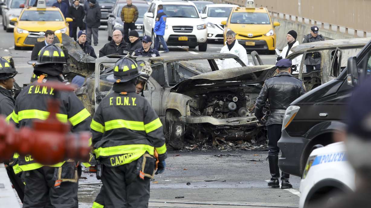 The Latest: Police ID victim in fiery Brooklyn Bridge crash