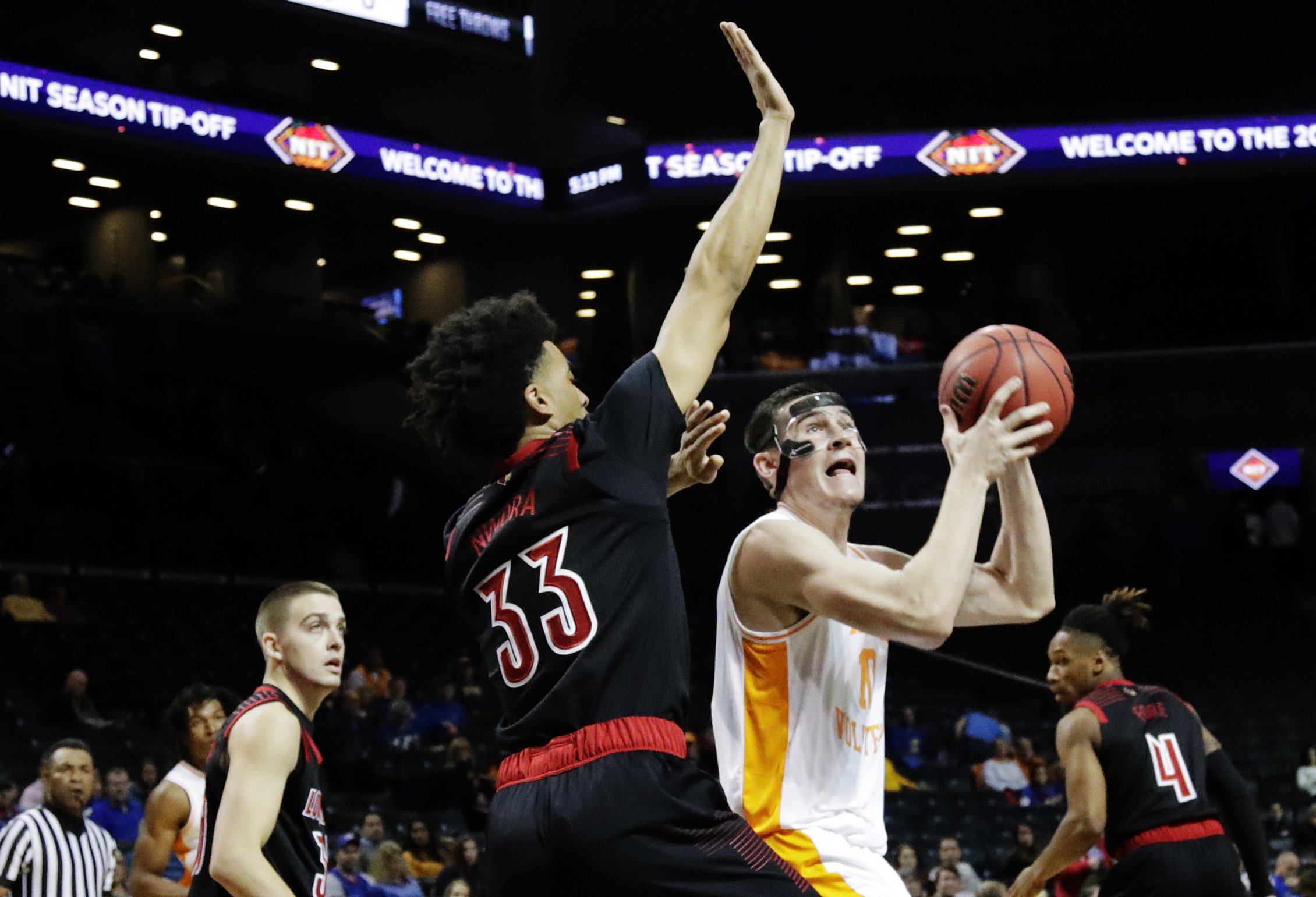 The Latest: No. 2 Kansas rallies past Marquette 77-68