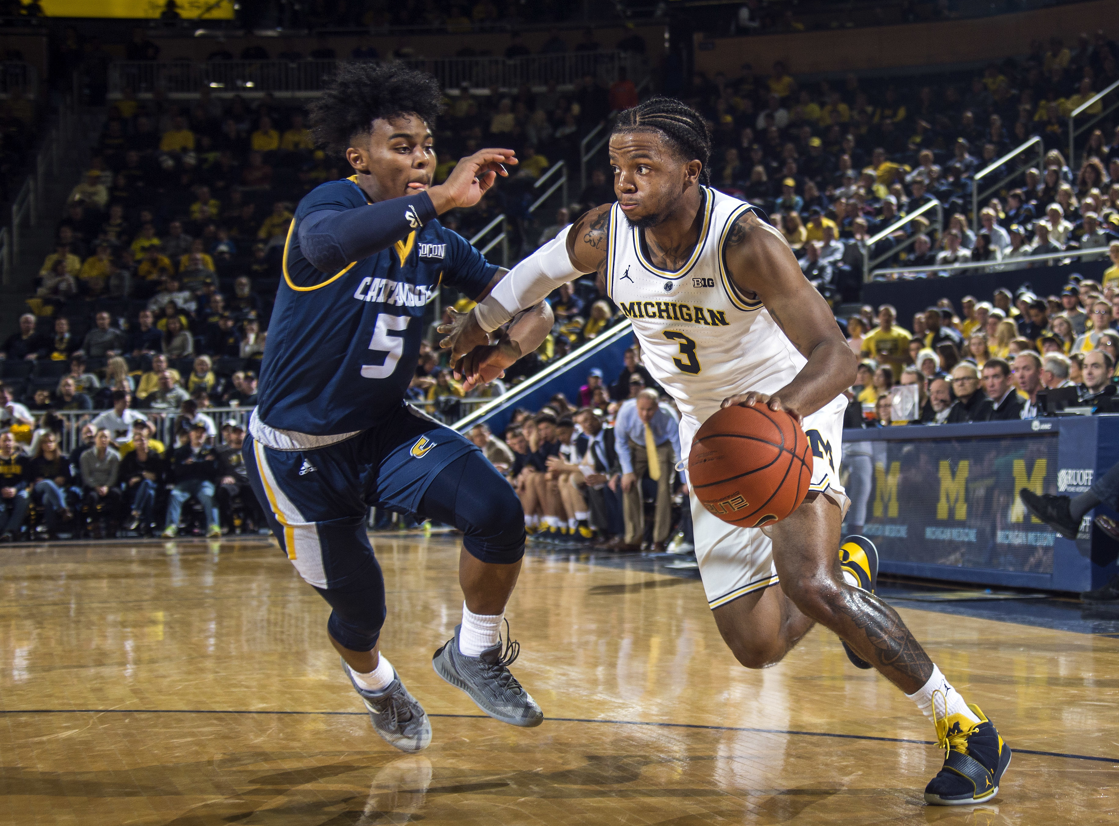 No. 9 Michigan rolls past Chattanooga 83-55