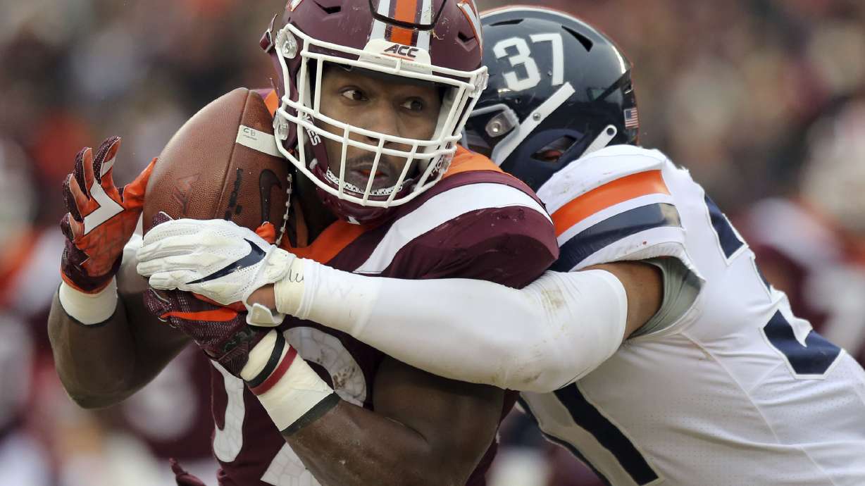 Overtime FG gives Hokies wild 34-31 win over Virginia