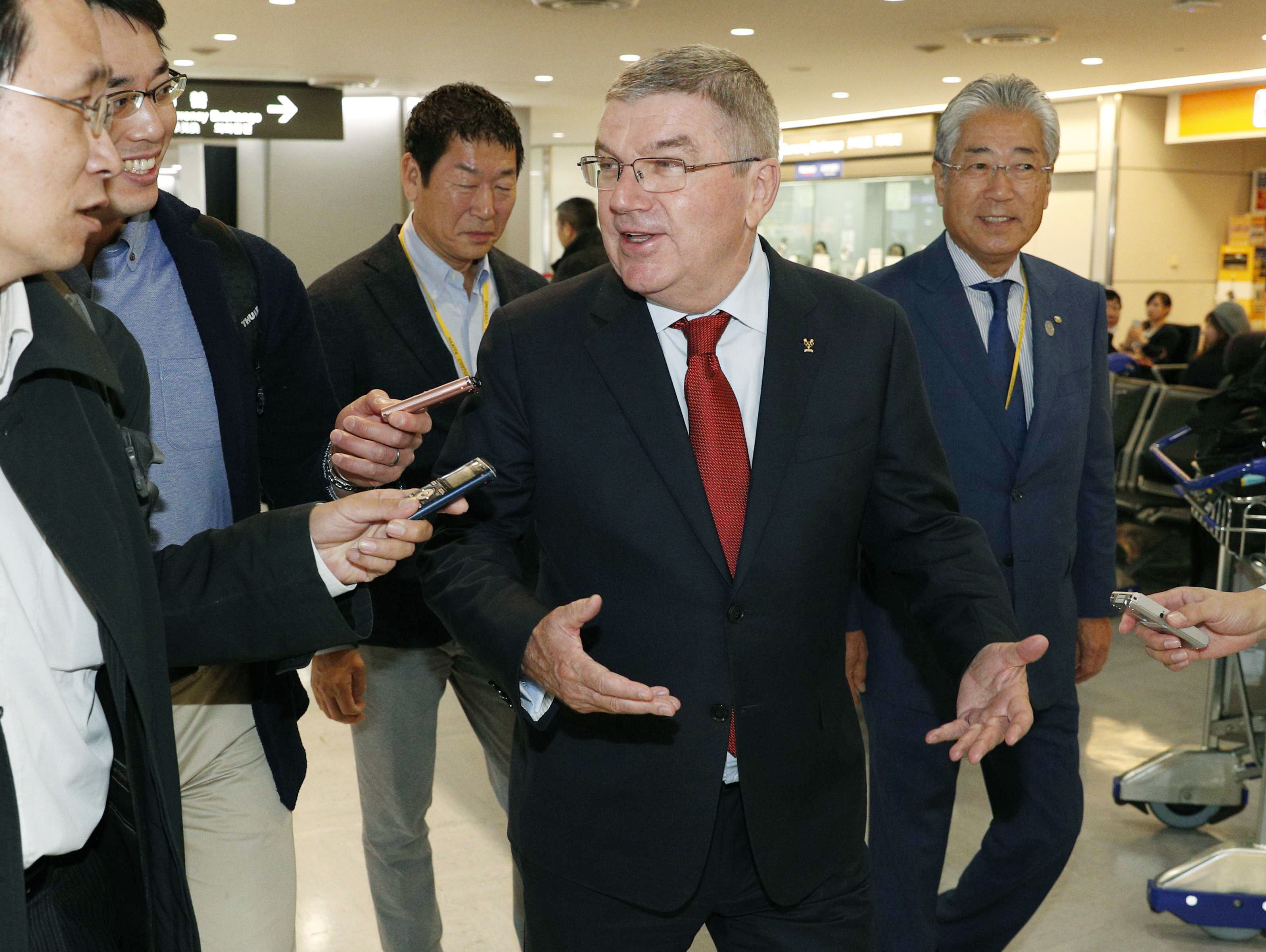 IOC's Bach and Abe make brief visit to Fukushima region