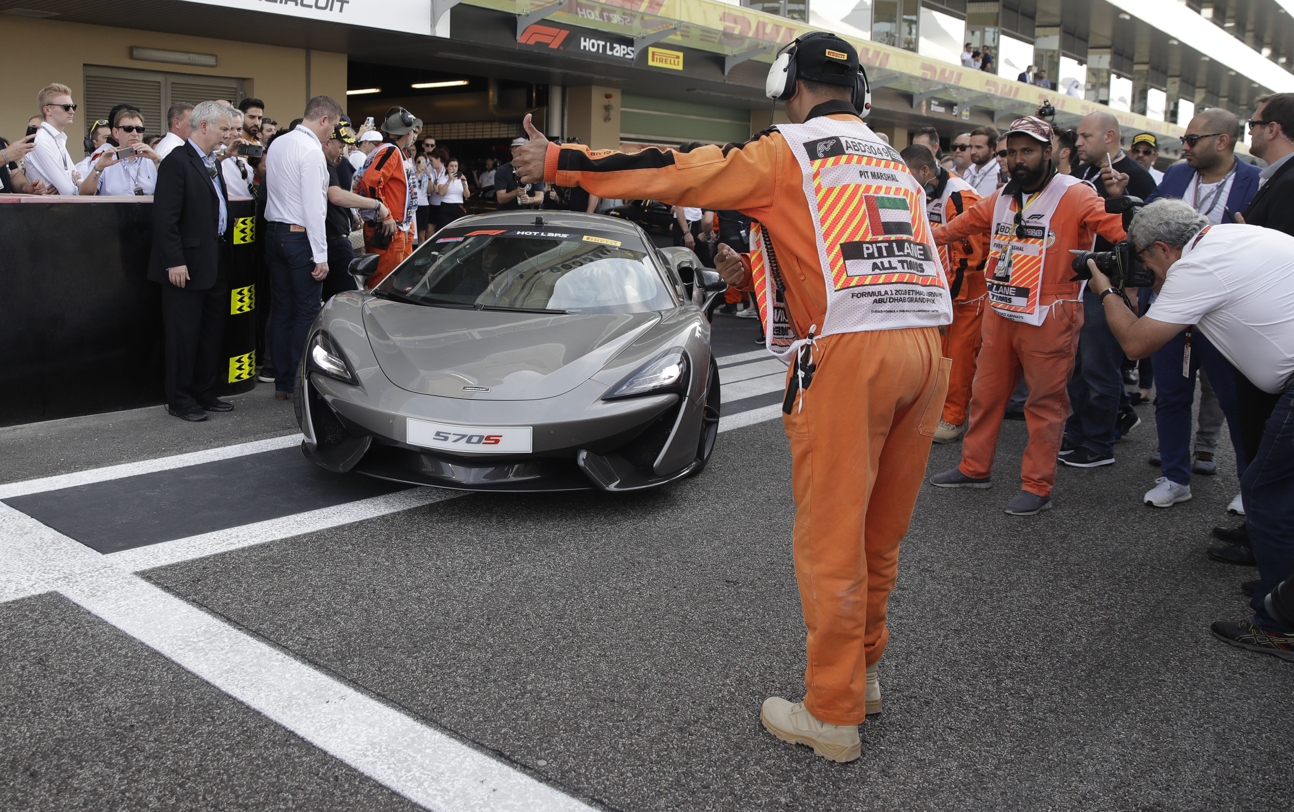 Racing greats Alonso and Johnson drive together in Abu Dhabi
