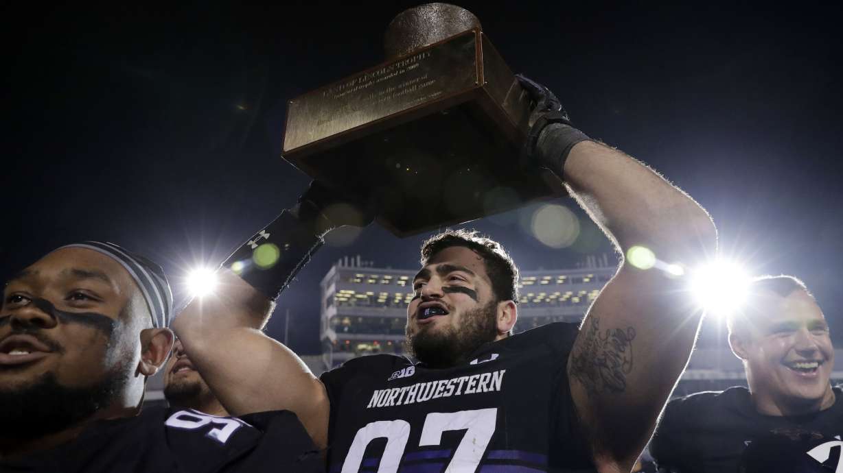 Thorson helps No. 20 Northwestern beats Illinois 24-16