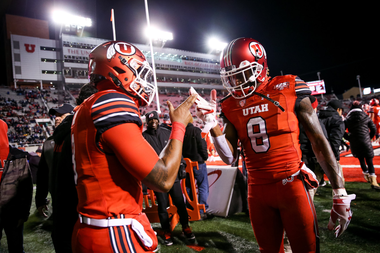 Utah Utes linebacker Chris Hart (8) and wide receiver Siaosi Mariner (8) take the field before the game against the Brigham Young Cougars at Rice-Eccles Stadium in Salt Lake City on Saturday, Nov. 24, 2018. (Photo: Spenser Heaps, Deseret News)