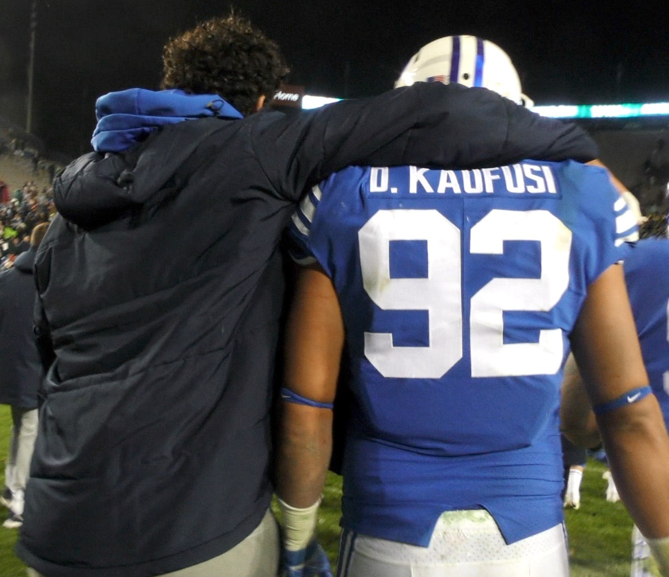 BYU defensive end Corbin Kaufusi, left, puts him arm around his brother, Devin Kaufusi, following the Cougars' 45-10 win over New Mexico State on Saturday, Nov. 17, 2018 at LaVell Edwards Stadium in the team's home finale. (Photo: Brandon Judd, Deseret News)