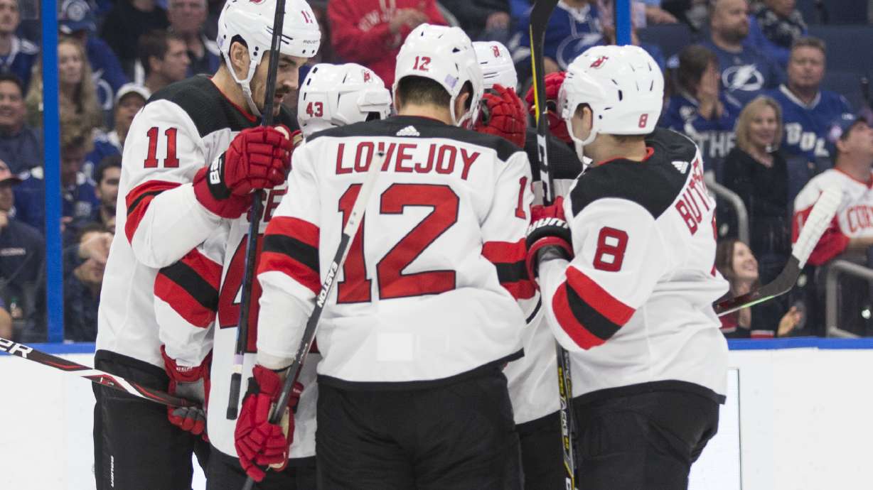 Point scores twice, Lightning stop Devils 5-2