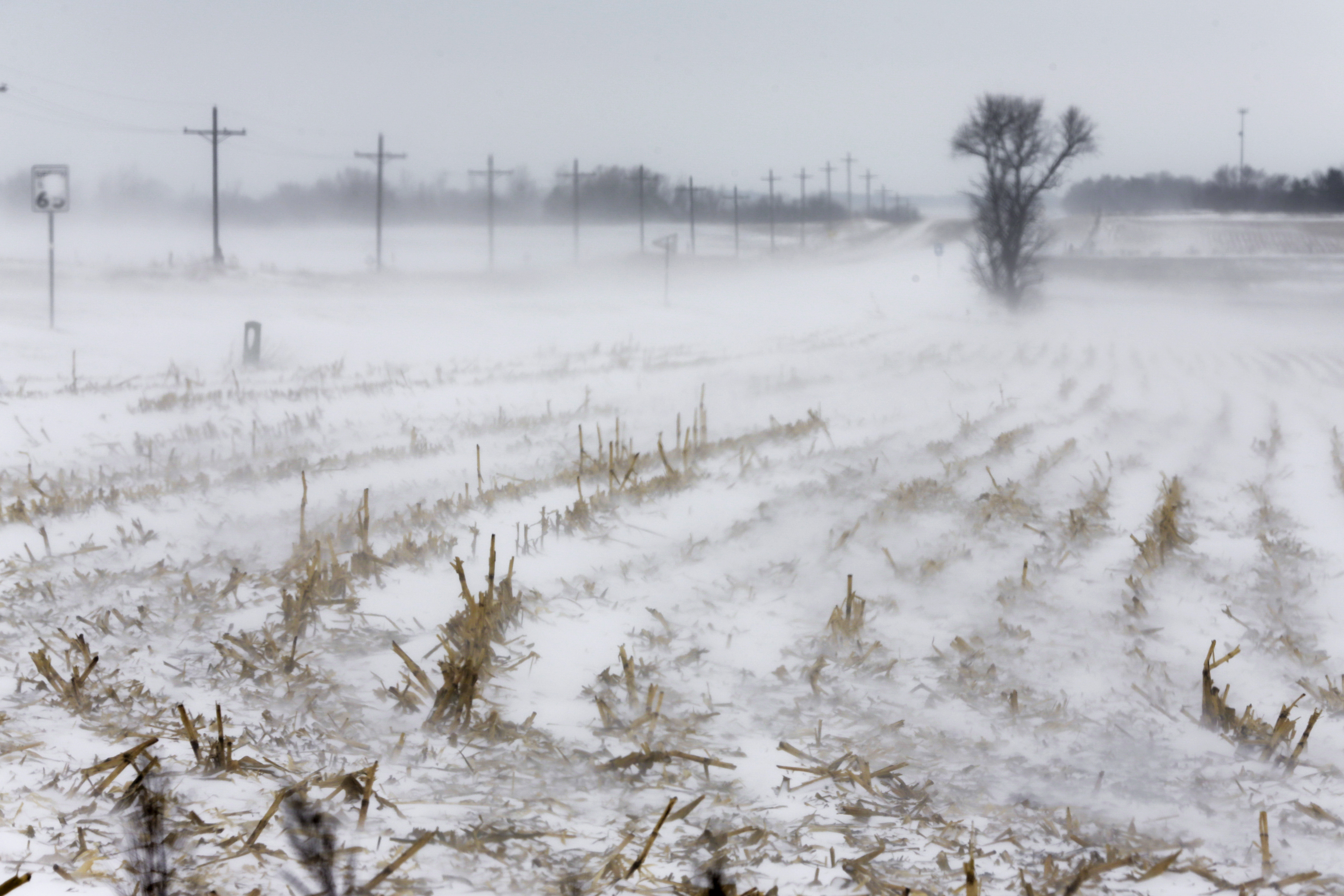 Flights canceled, schools closed after Midwest snowstorm
