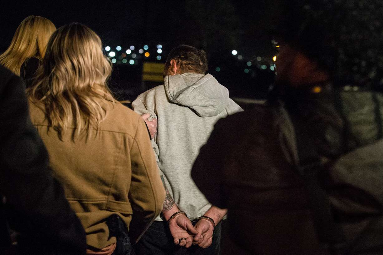 Jeffery Black, 43, arrested for investigation of murder in the death of South Salt Lake police officer David Romrell, is escorted out of the Salt Lake County Sheriff's Office in Salt Lake City on Monday, Nov. 26, 2018. (Photo: Qiling Wang, KSL)