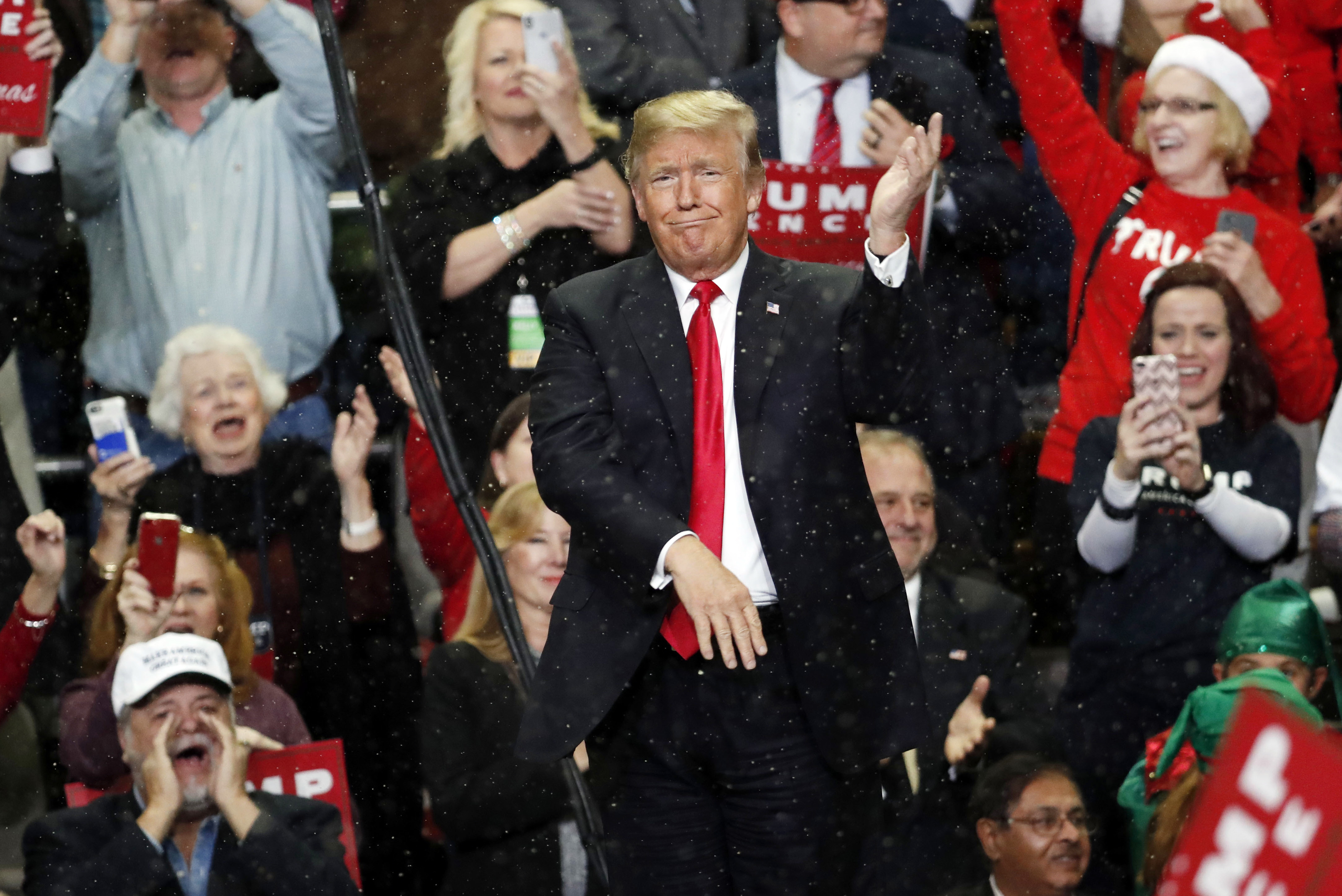 The Latest: Trump accuses Mueller of 'ruining lives'