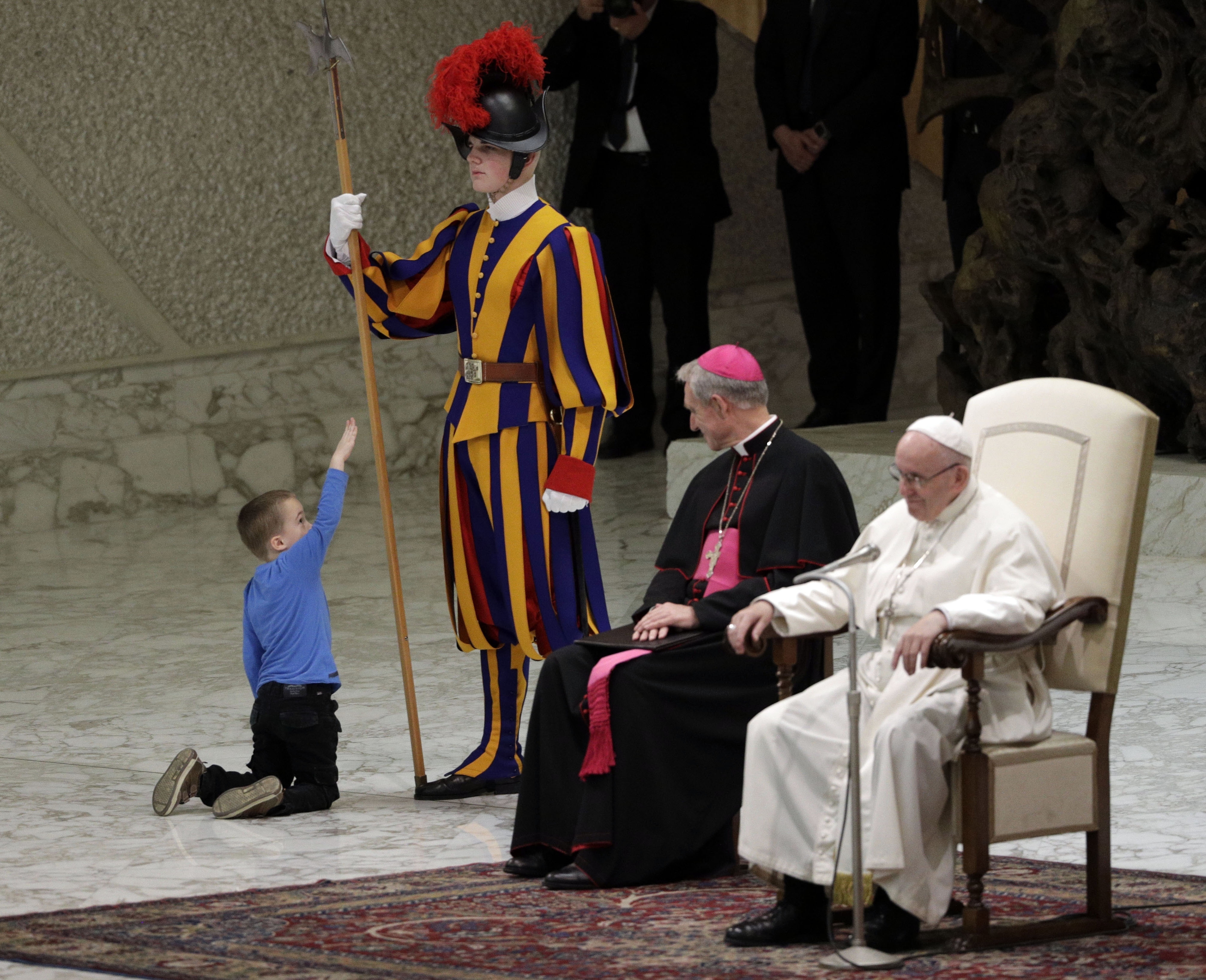 Pope charmed by 'undisciplined' disabled child