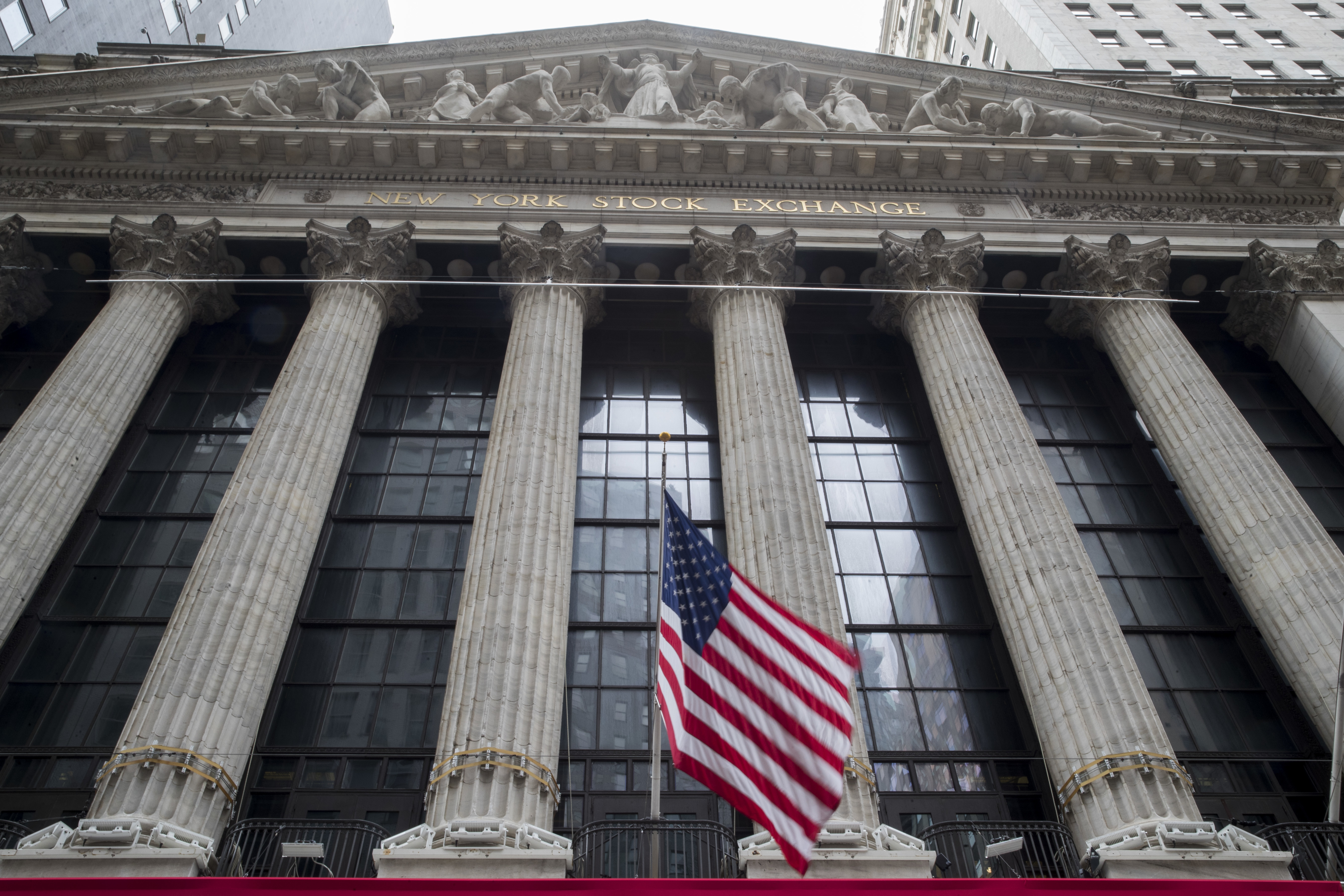 Markets Right Now: Stocks surge on hint of slower rate hikes