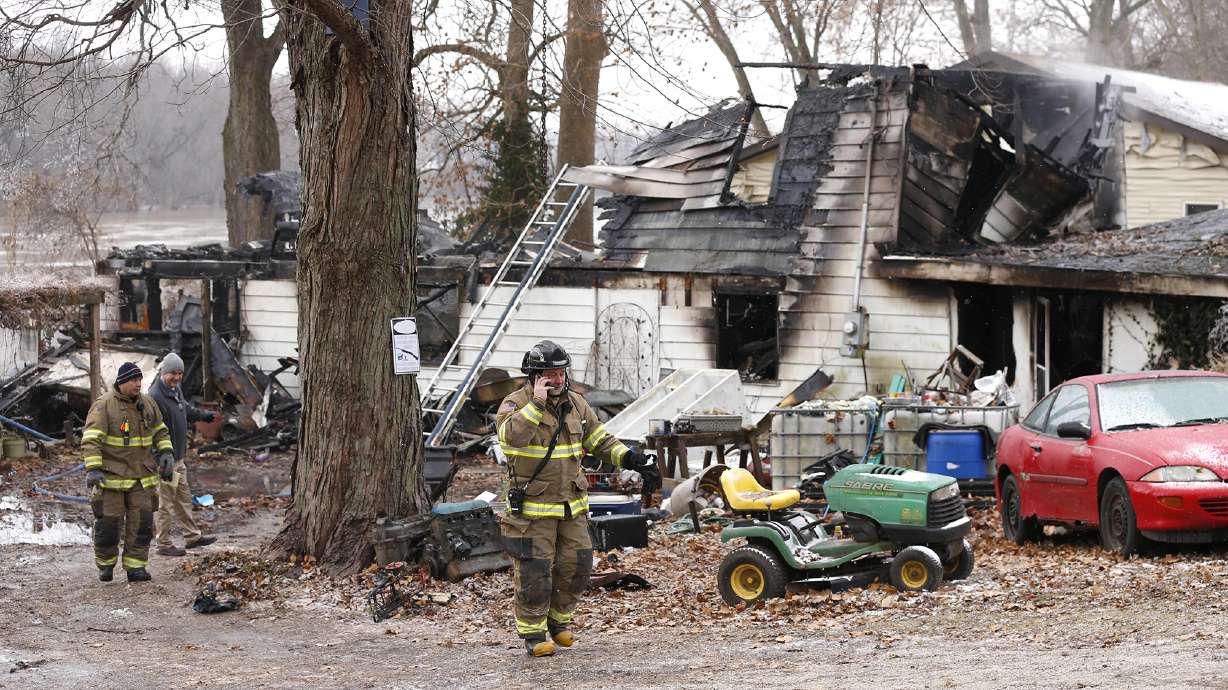 The Latest: Police: 4 children among 6 Indiana fire victims