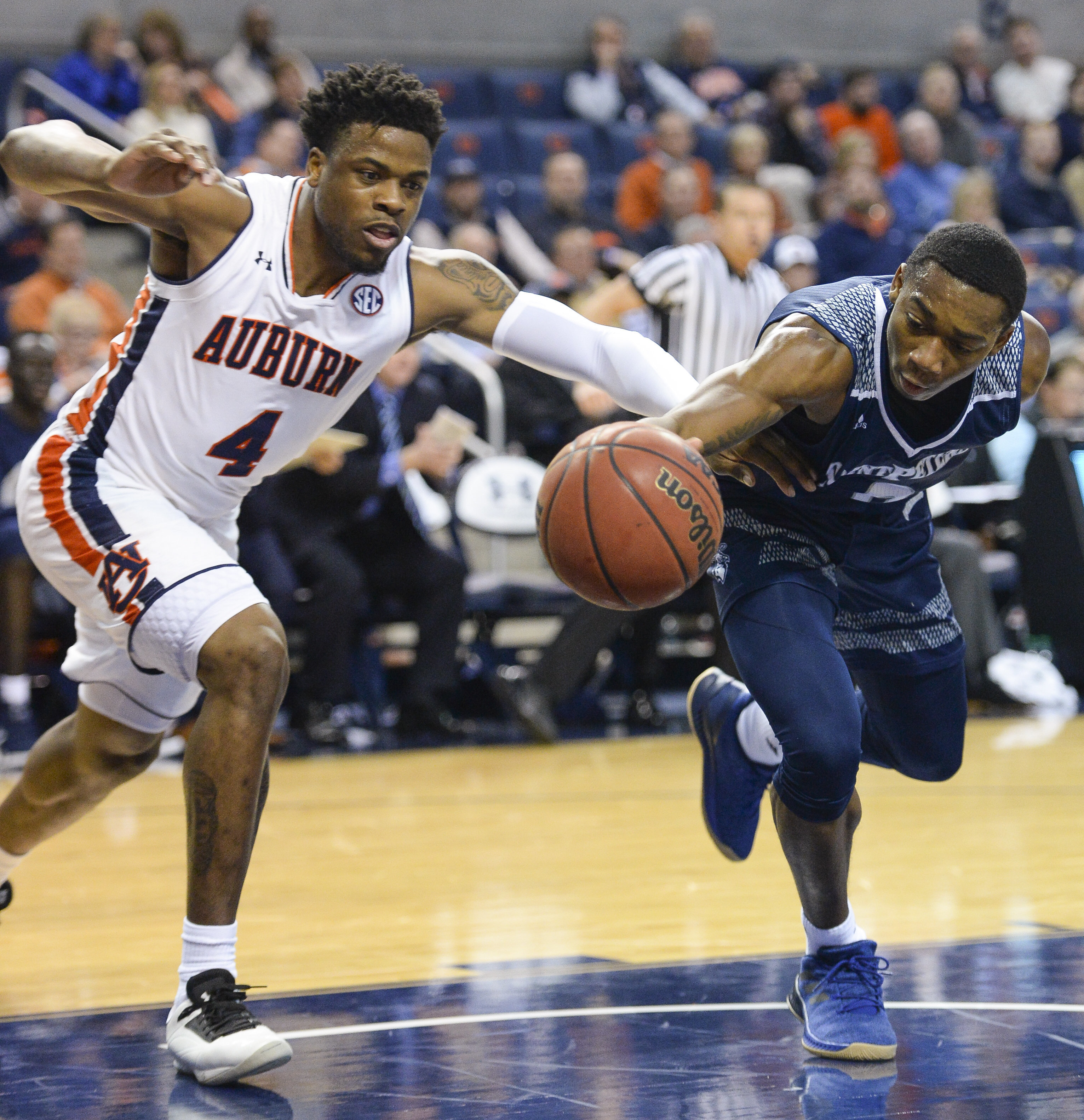 Brown, McLemore lead Auburn's 99-49 rout of Saint Peter's