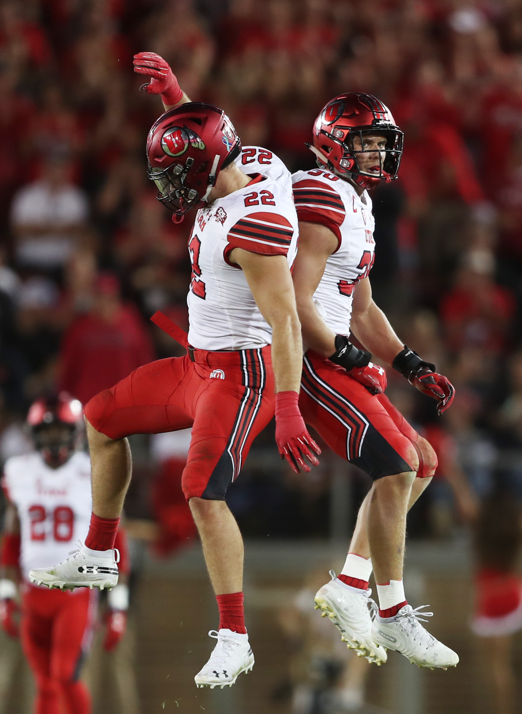 Utah Utes linebacker Chase Hansen (22) and Utah Utes linebacker Cody Barton (30) celebrate after a quarterback sack as Utah and Stanford play a football game in Palo Alto California on Saturday, Oct. 6, 2018. (Photo: Scott G. Winterton, KSL)