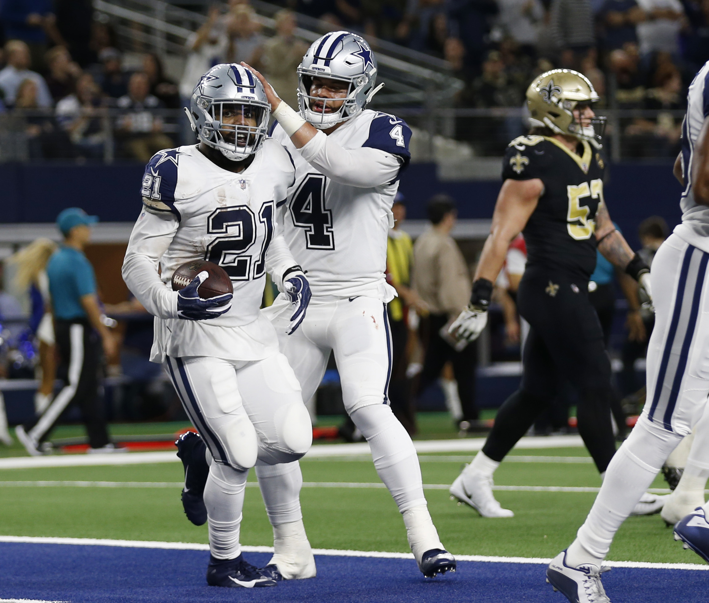 Cowboys stifle Brees, end Saints' 10-game win streak, 13-10