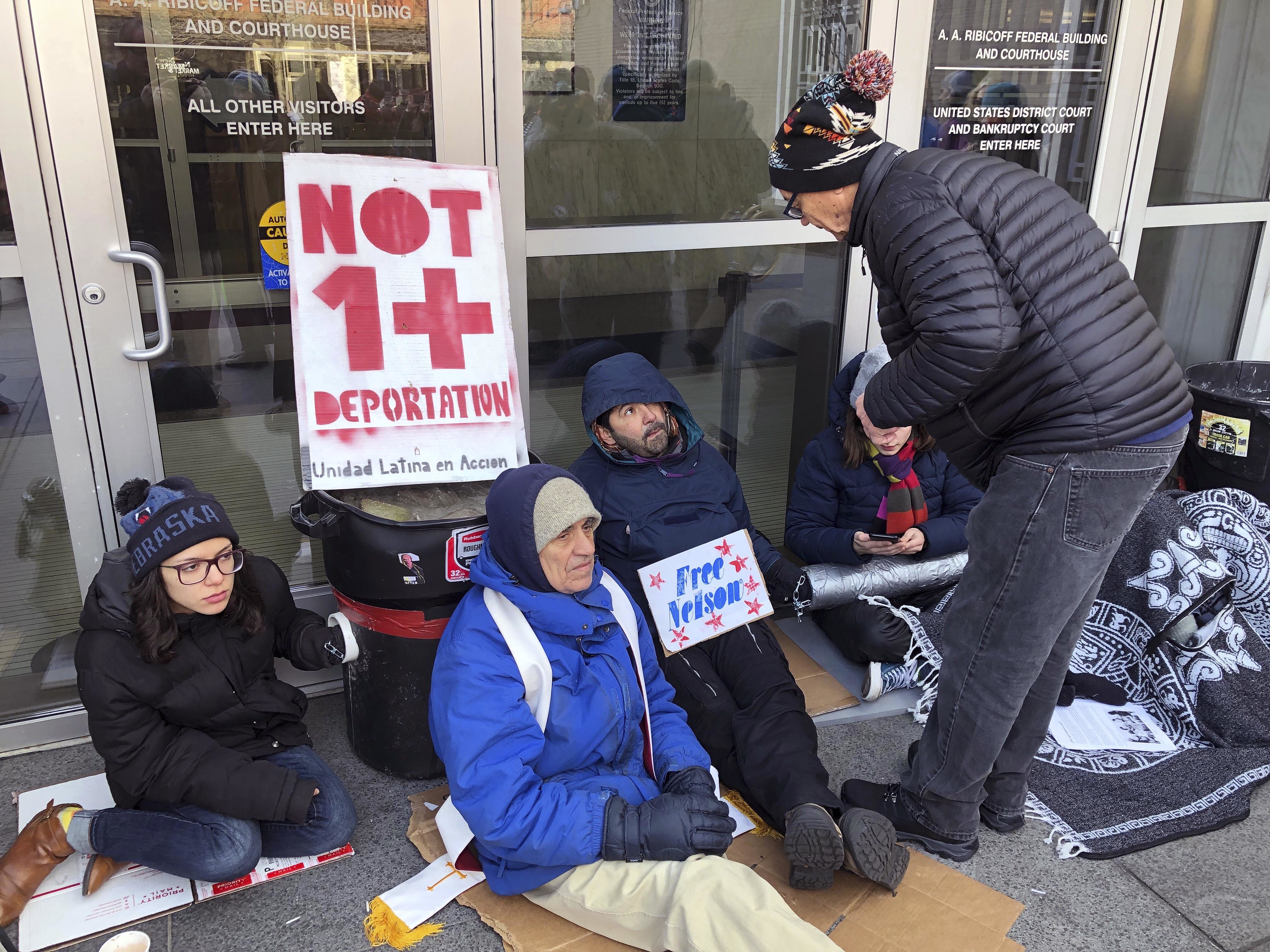 The Latest: Immigrant's supporters end courthouse protest