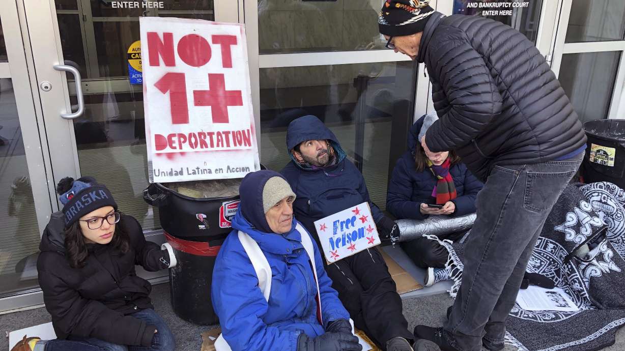 The Latest: Immigrant's supporters end courthouse protest