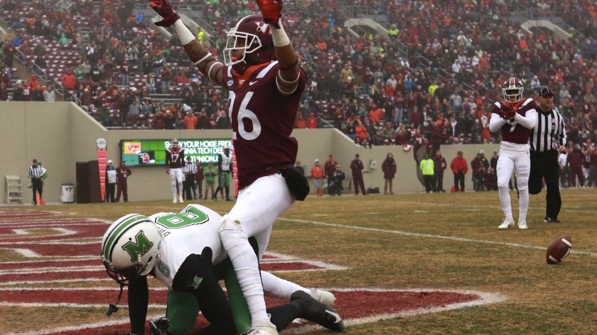 Willis' 4 TD throws carry Hokies past Marshall, 41-20