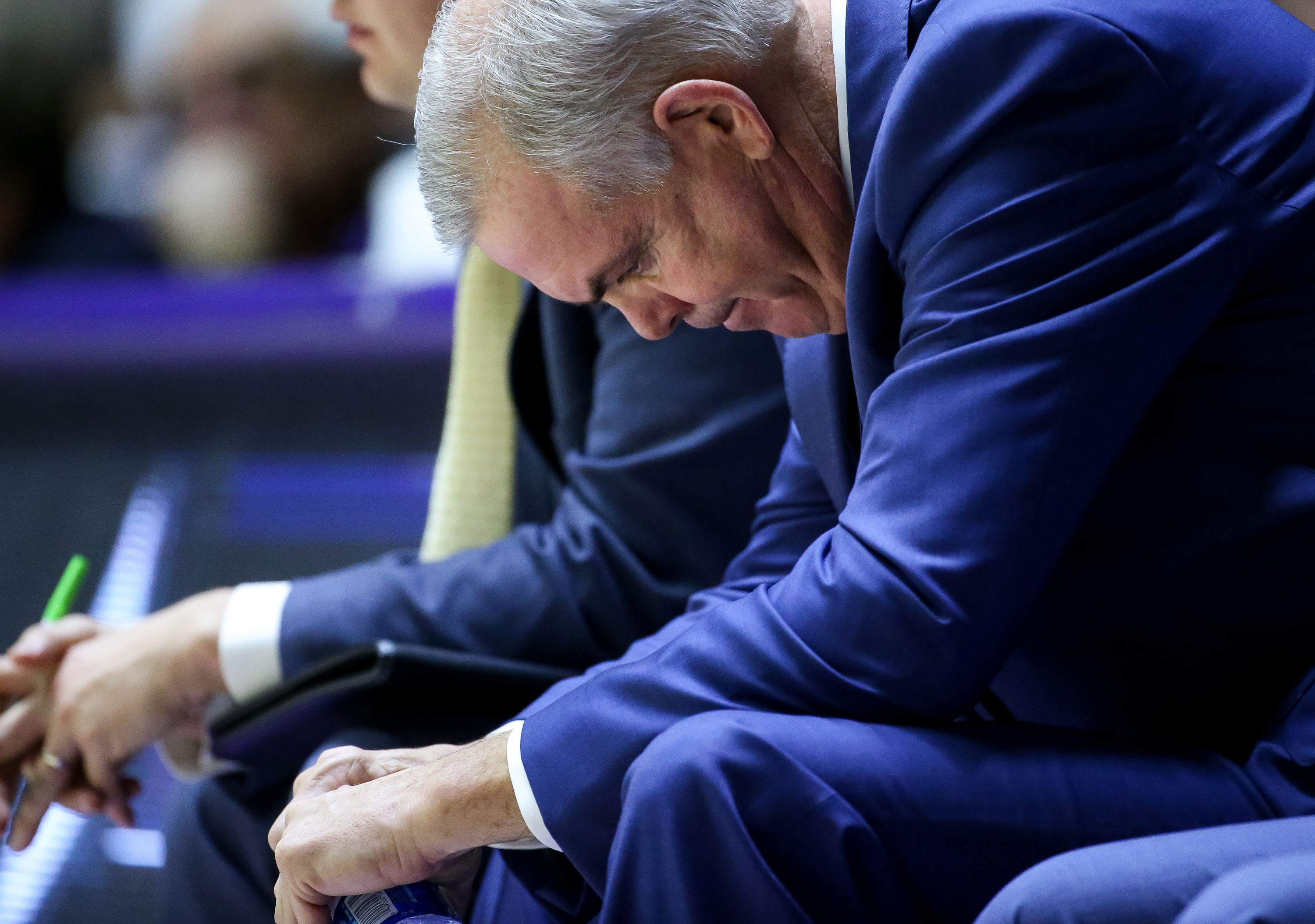 Brigham Young Cougars head coach Dave Rose sits on the sideline as the Cougars trail the Weber State Wildcats at the Dee Events Center in Ogden on Saturday, Dec. 1, 2018.