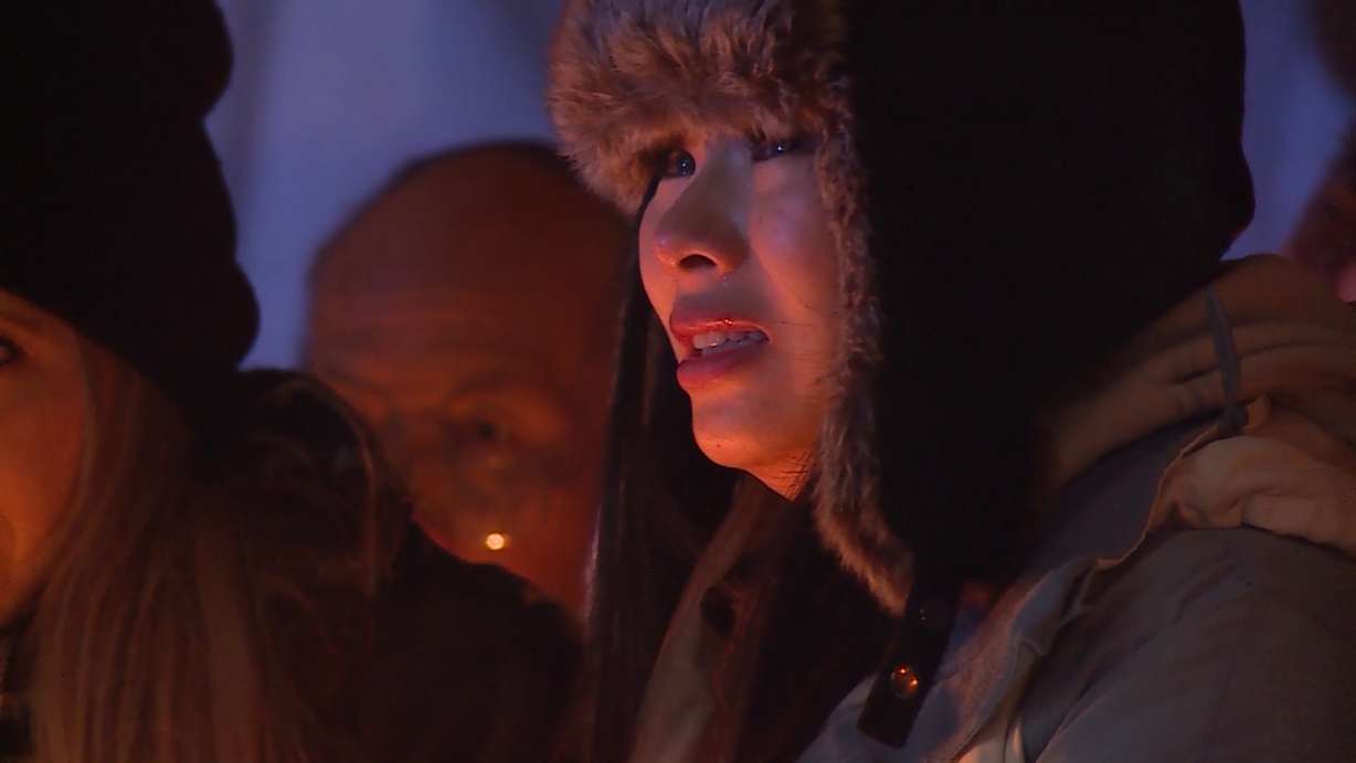Elizabeth, wife of slain South Salt Lake police officer David Romrell, is pictured at an emotional vigil in honor of her husband on Sunday, Dec. 2, 2018. (Photo: Adam Sotelo, KSL TV)