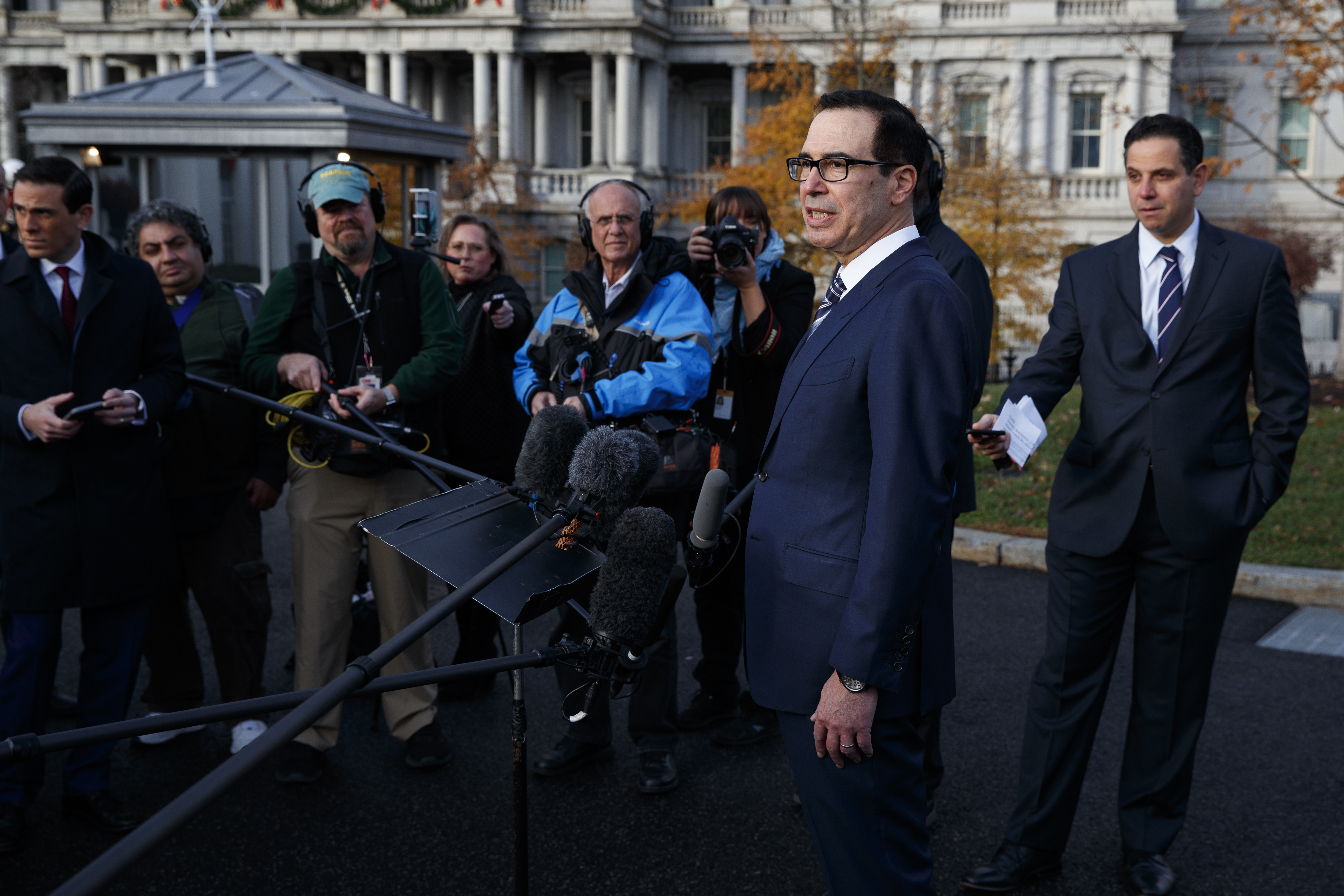 The Latest: Trump aide: 90-day clock on China starts Jan. 1
