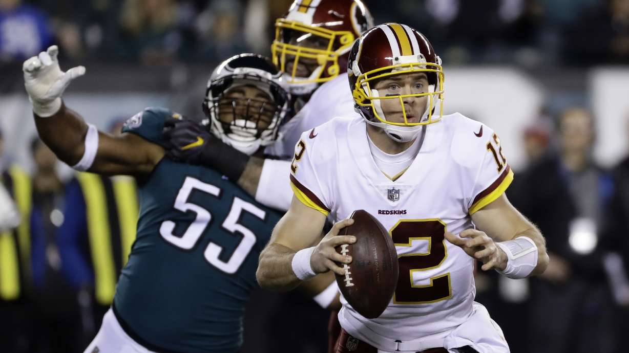 Redskins QB McCoy breaks fibula in right leg, out for season