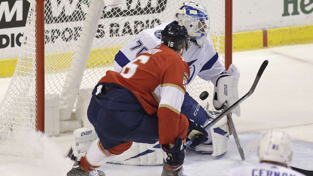 Wade crashes into a fan -- Panthers star Aleksander Barkov