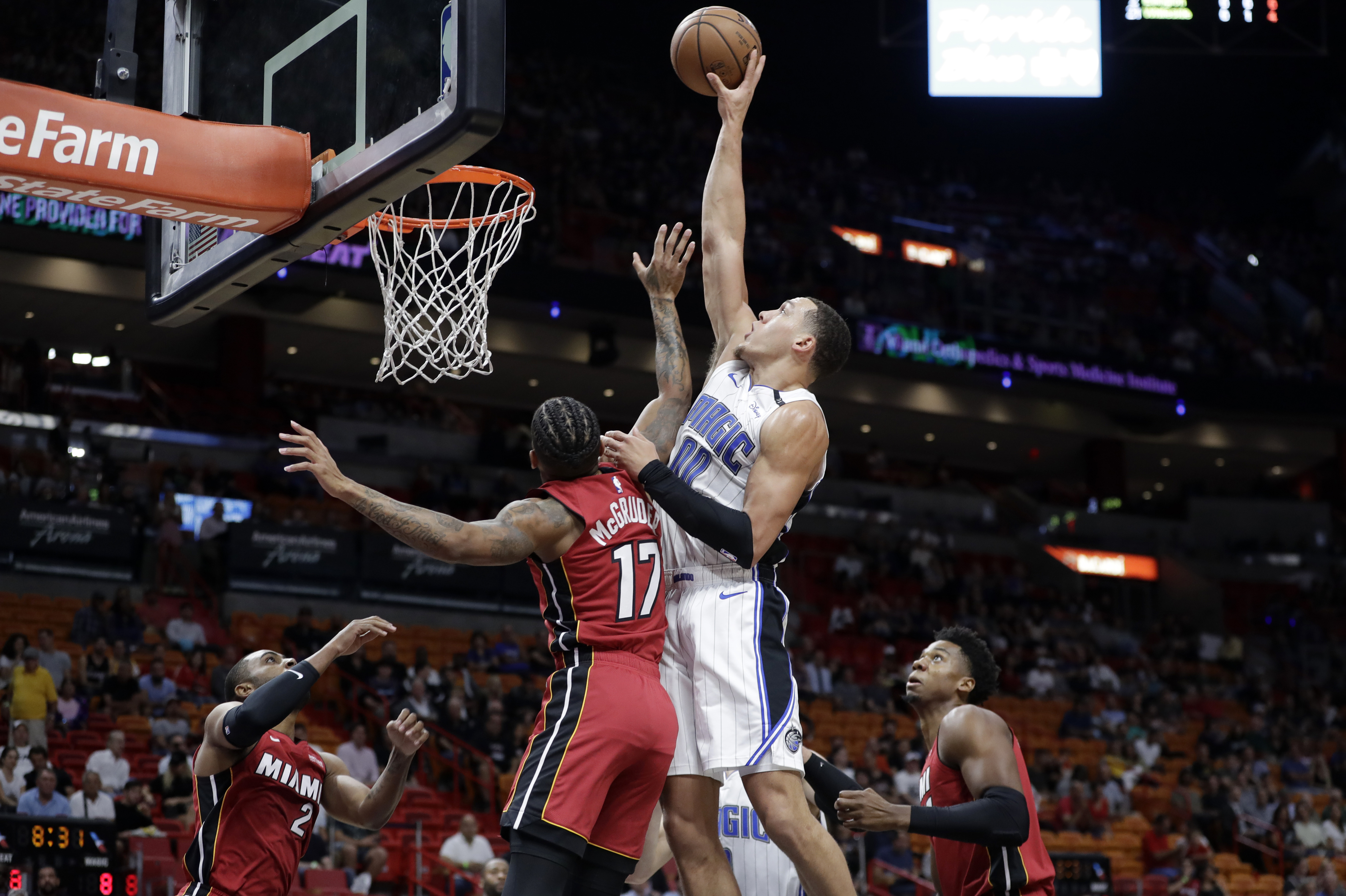 Gordon scores 20, Magic run away to top Heat 105-90