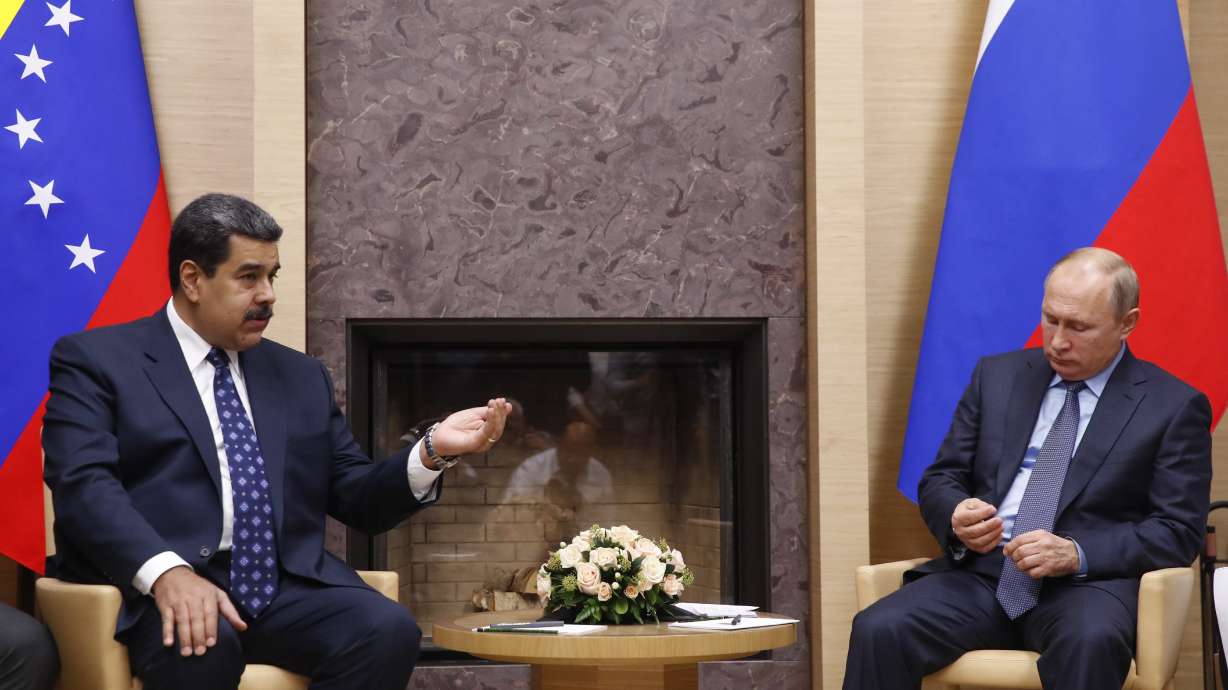 Putin voices support for Venezuelan leader visiting Russia
