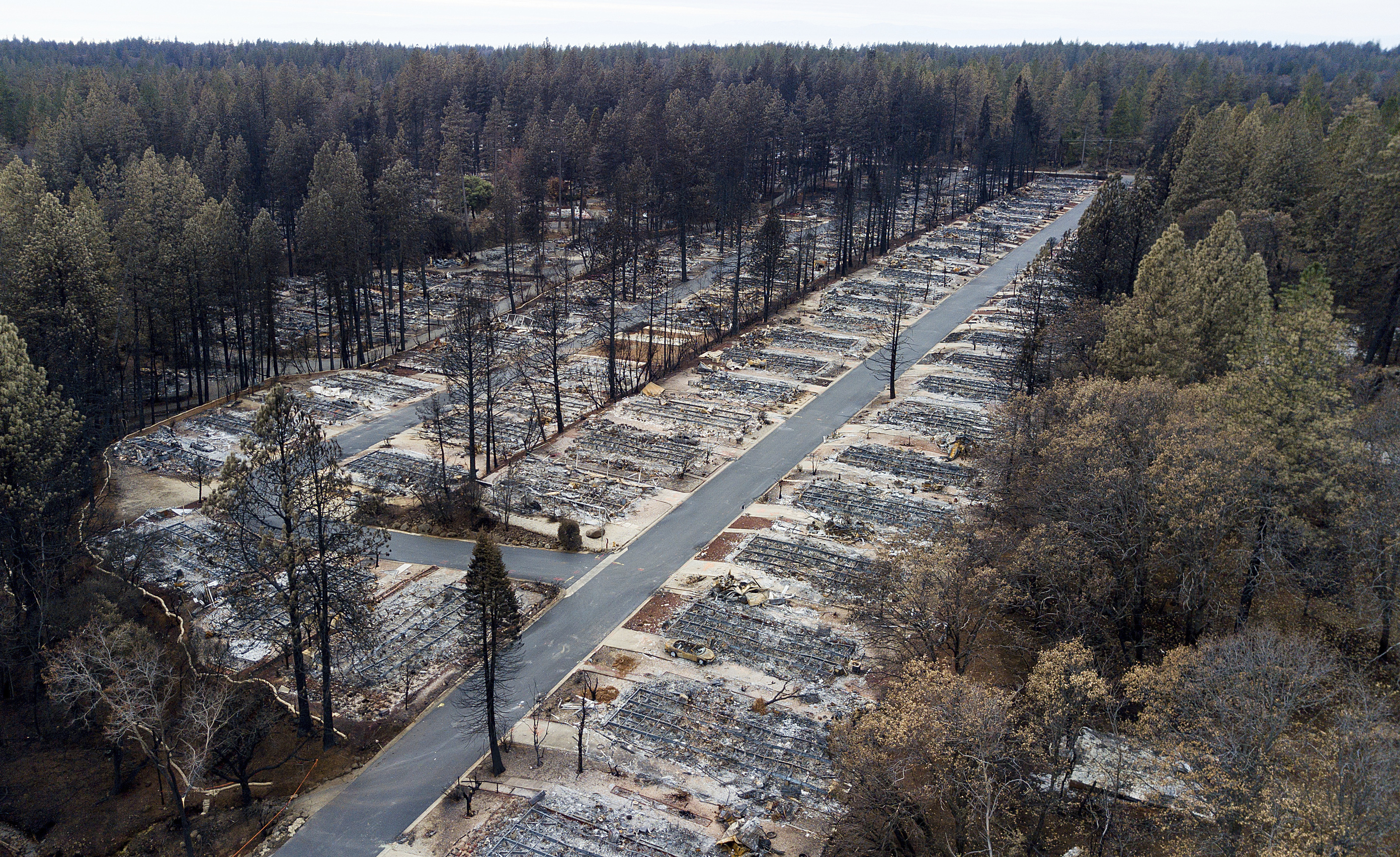 Residents return to California town leveled by wildfire