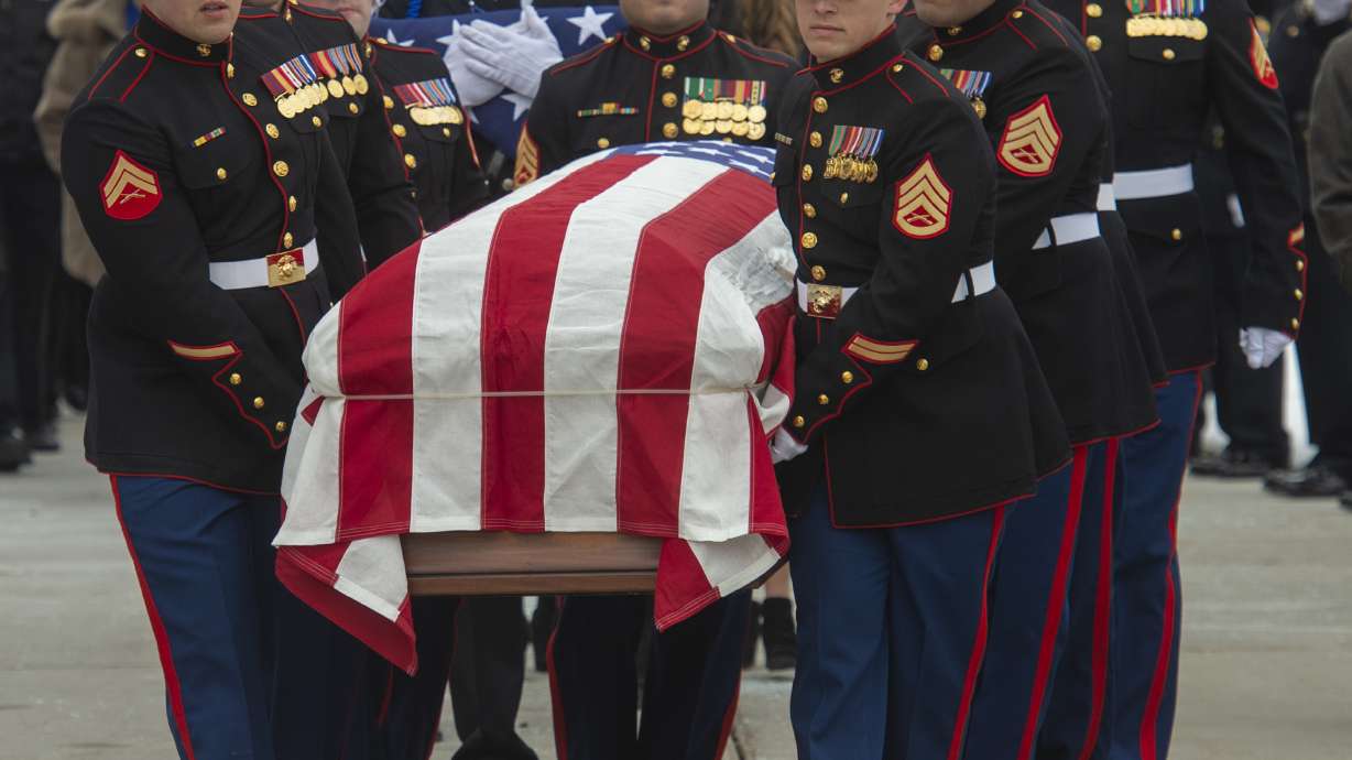 Slain Utah police officer honored at public funeral