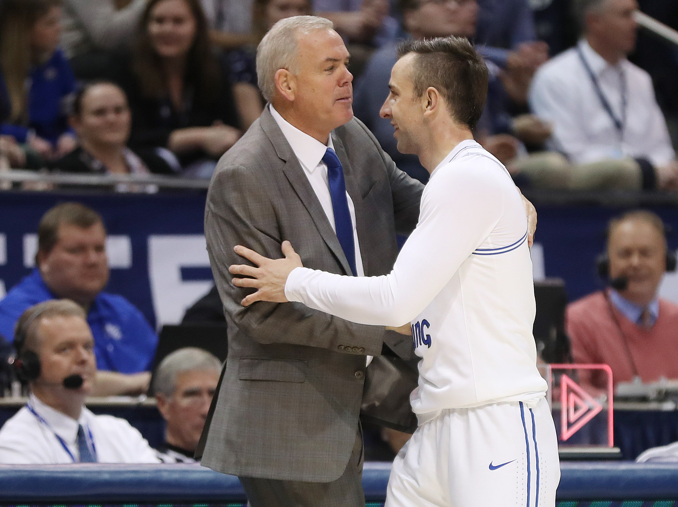Brigham Young Cougars head coach Dave Rose and Brigham Young Cougars guard Nick Emery (4) hug at the end of the game in Provo on Wednesday, Dec. 5, 2018. BYU won 95-80. (Photo: Jeffrey D. Allred, KSL)