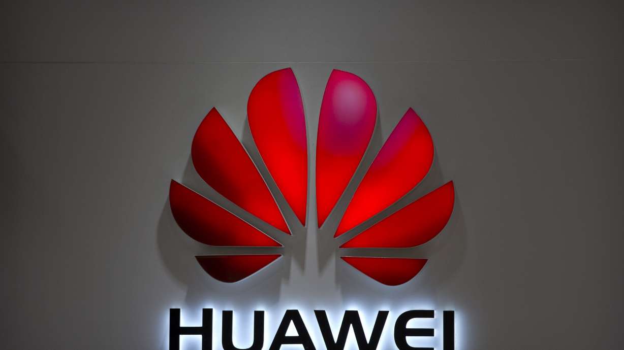 The Latest: Warner calls Huawei threat to national security