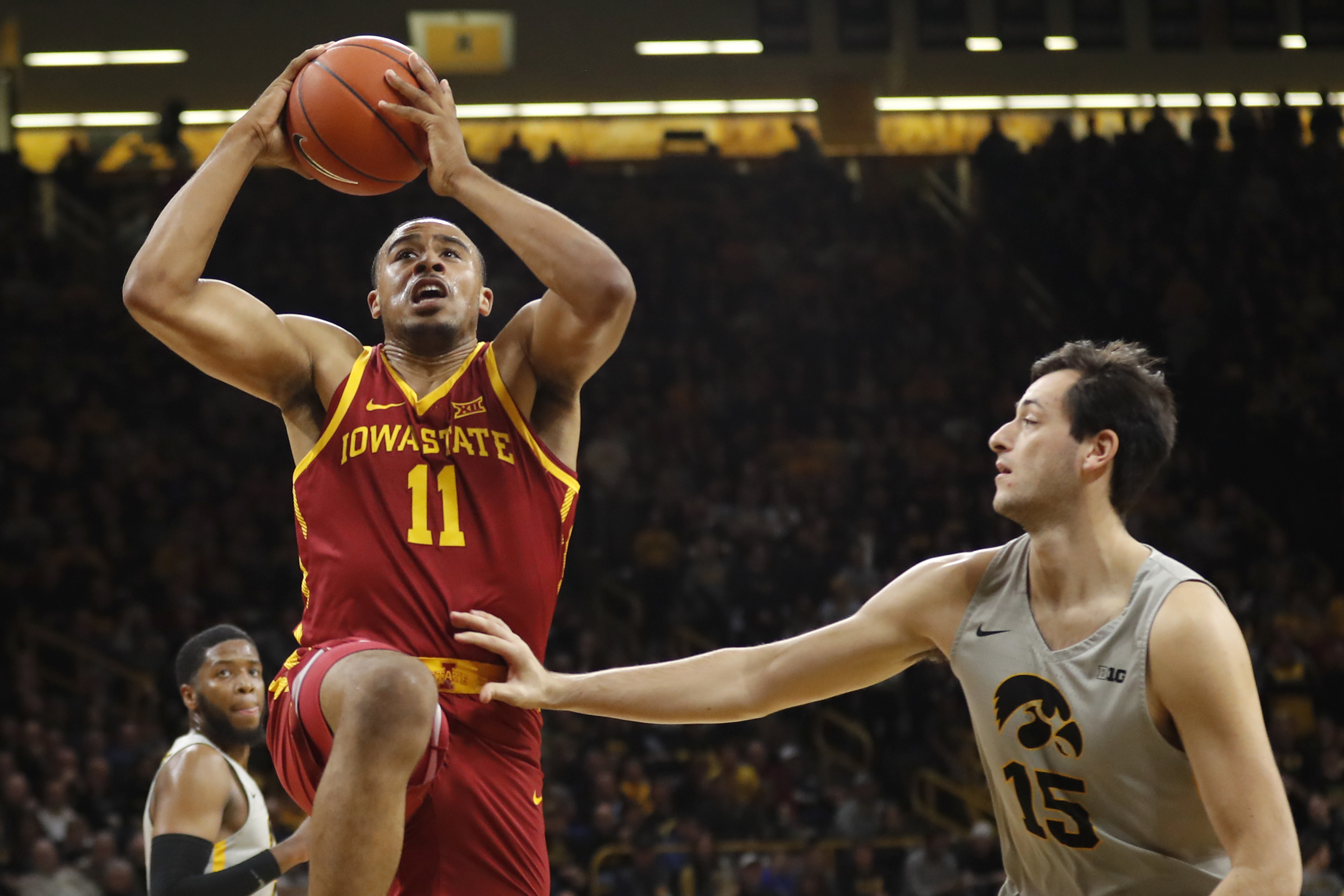 No. 18 Iowa cruises past Iowa State, 98-84