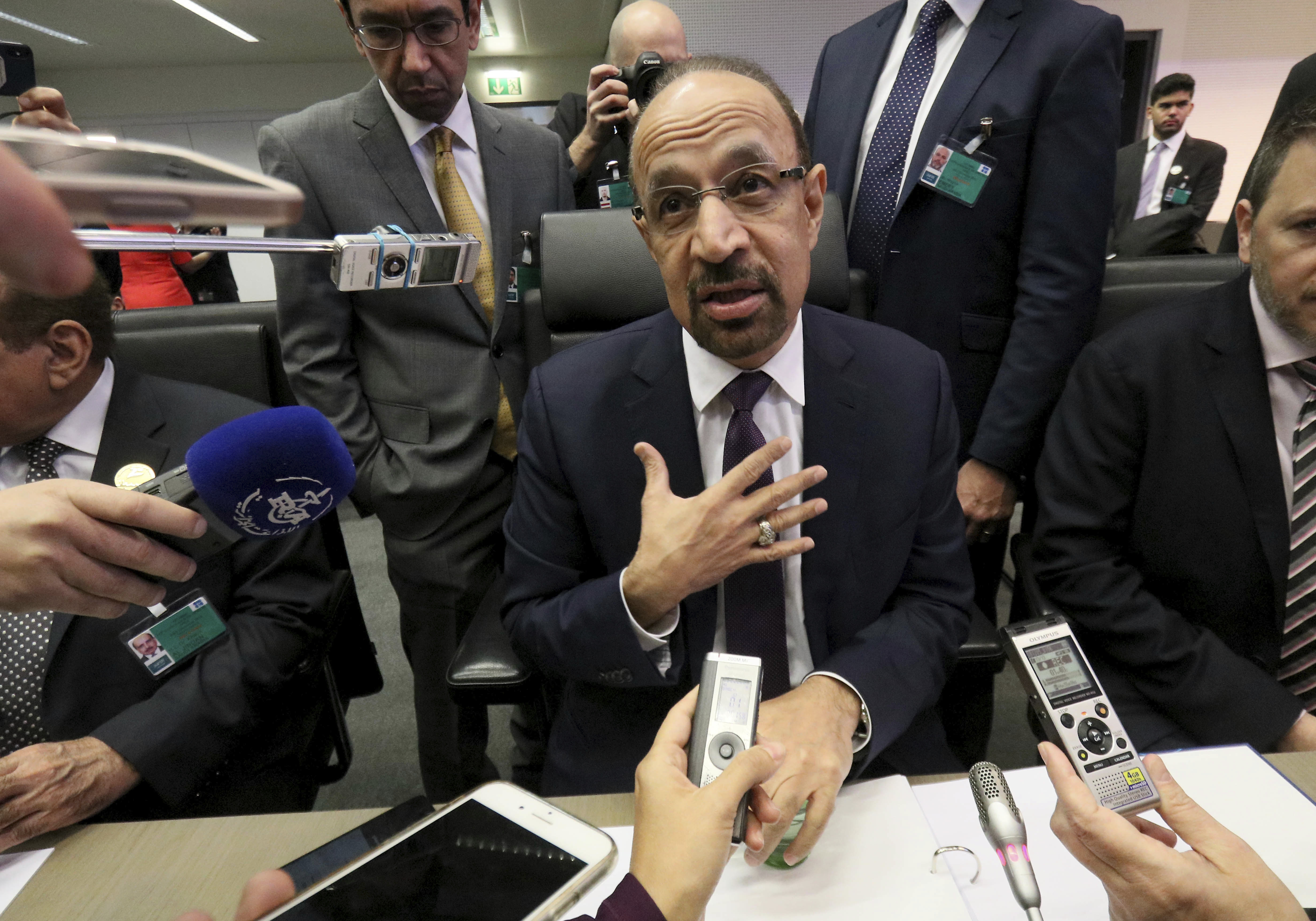 The Latest: OPEC backs 6-month oil production cut package