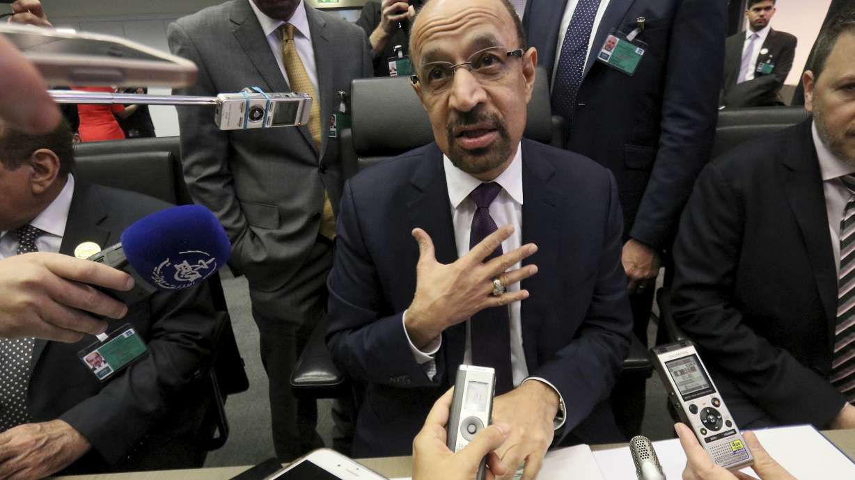 The Latest: OPEC backs 6-month oil production cut package