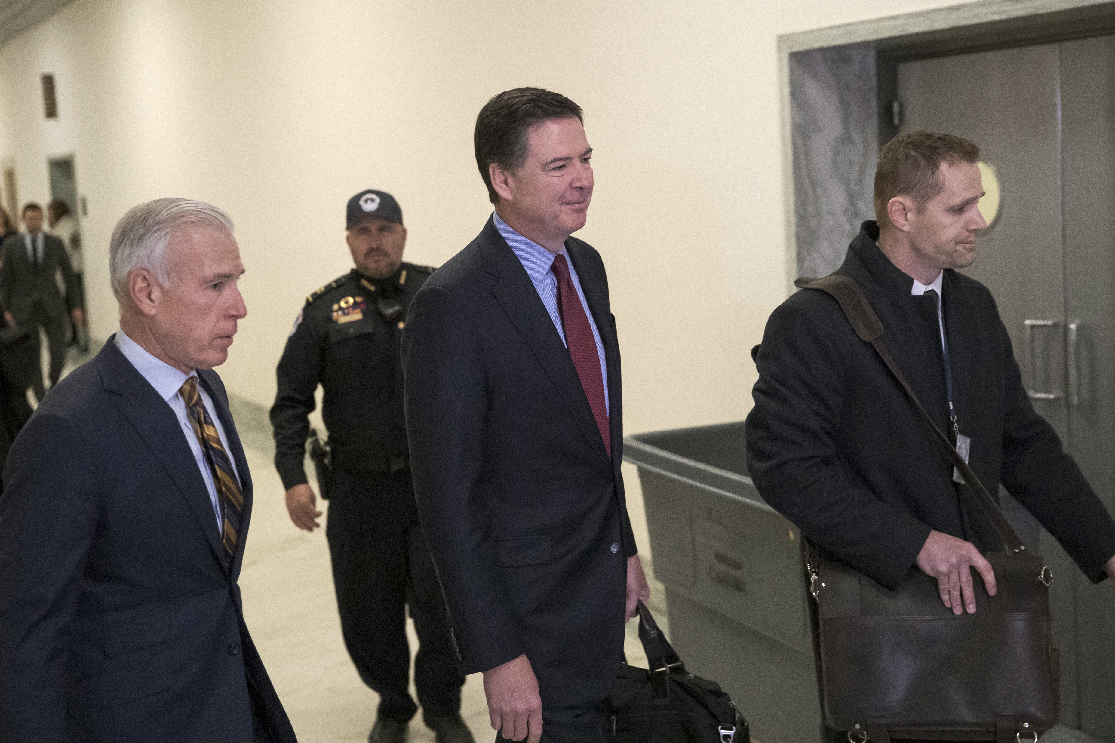 The Latest: Comey says lawmakers focused on Clinton emails