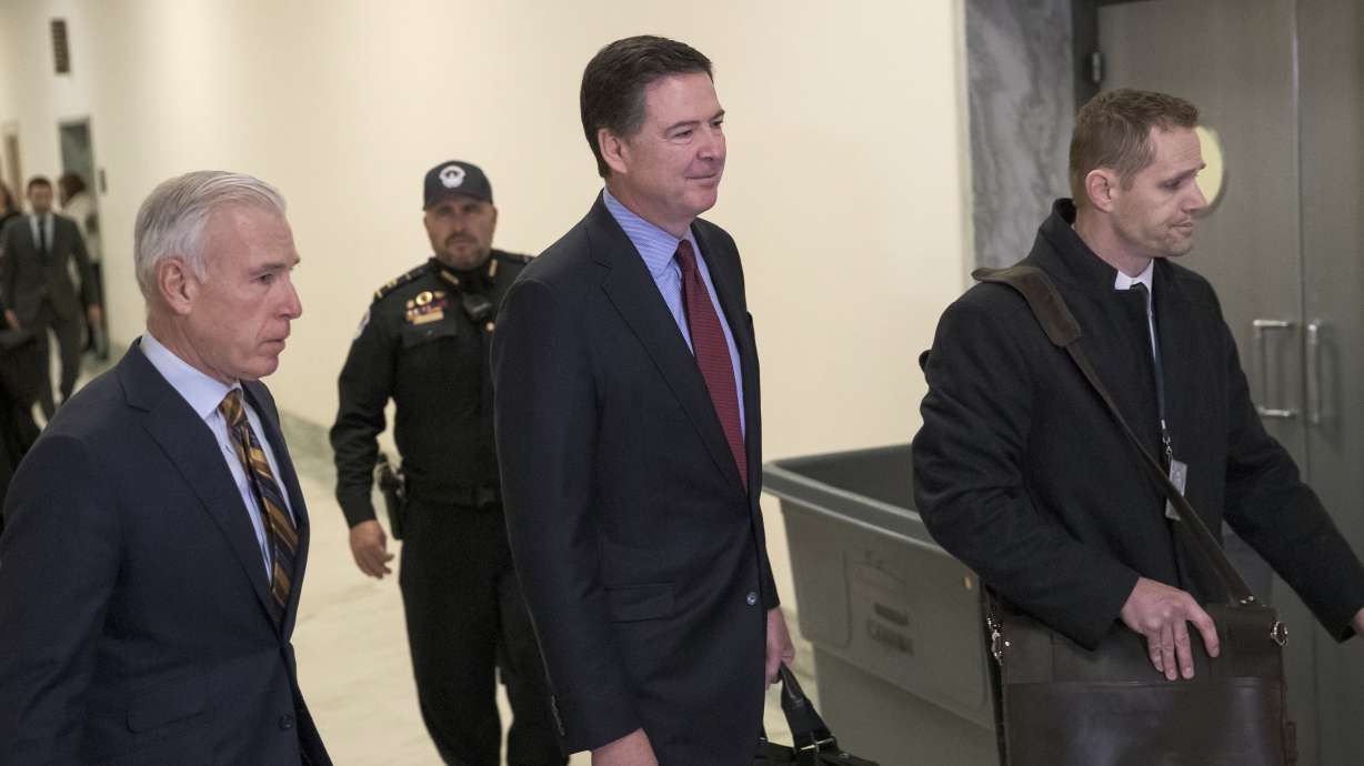 The Latest: Comey says lawmakers focused on Clinton emails