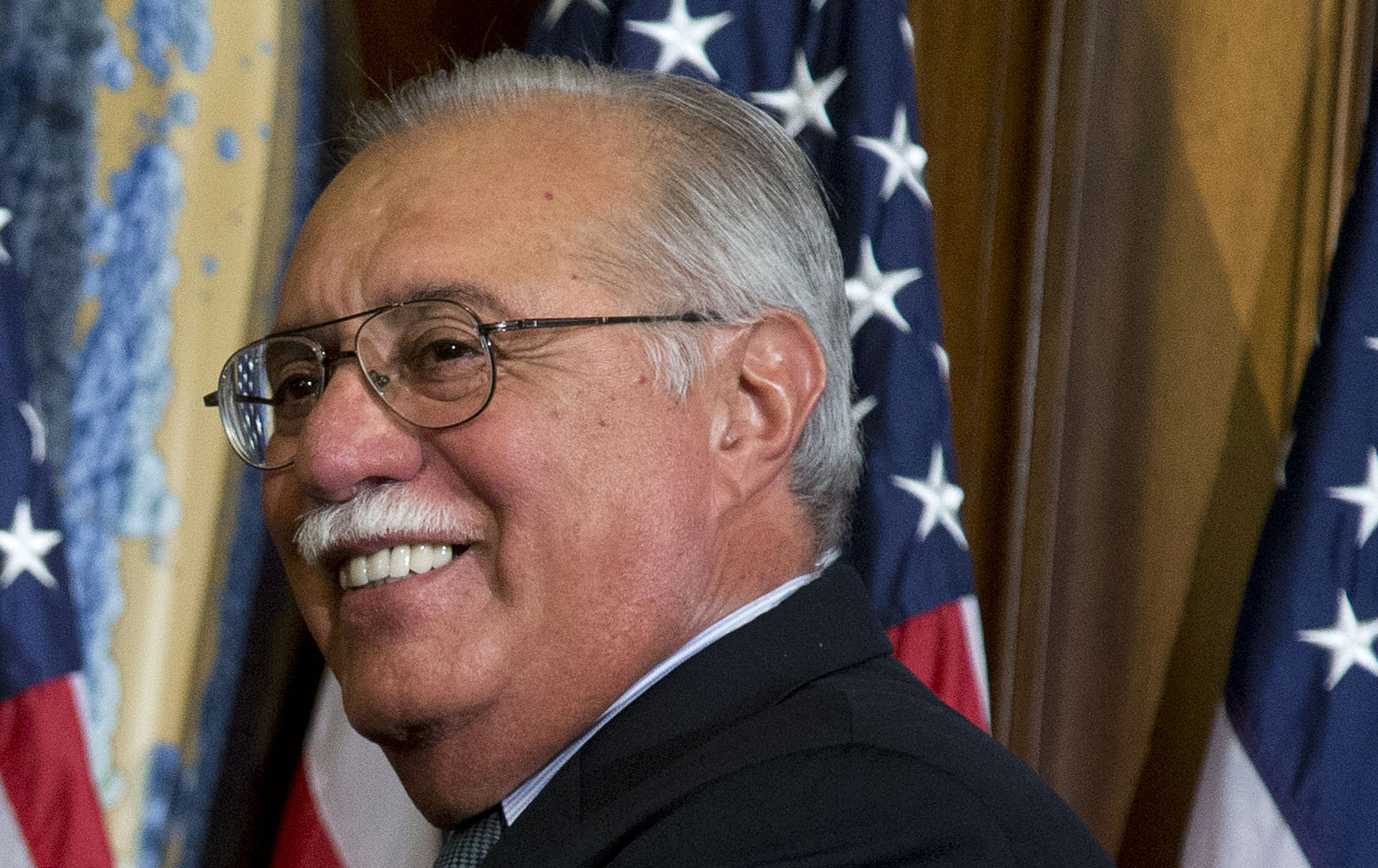 The Latest: Mourners gather to remember Arizona congressman