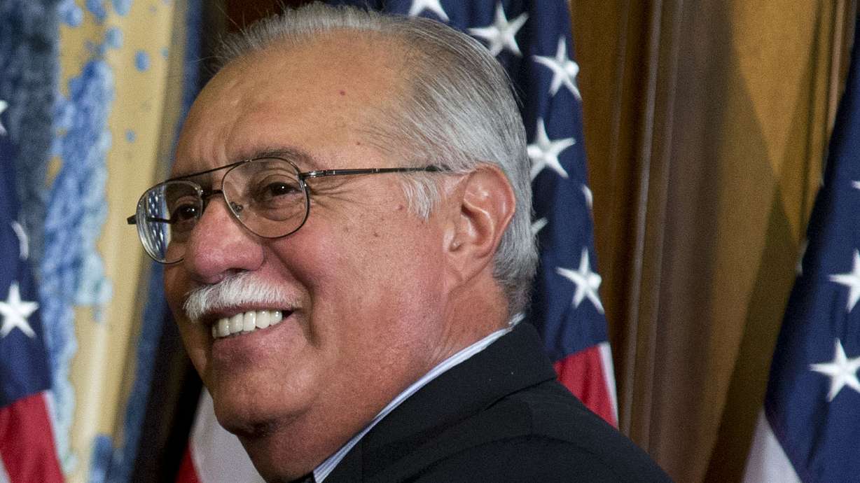 The Latest: Mourners gather to remember Arizona congressman