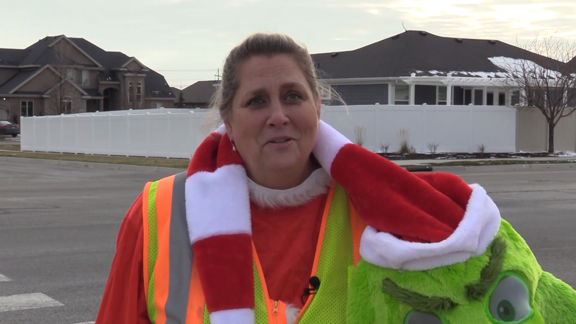 Karen Caldwell talks to KSL TV about her seasonal costumes. Every season or holiday Caldway dresses up to bring some cheer to kids walking to and from school. (Photo: KSL TV)