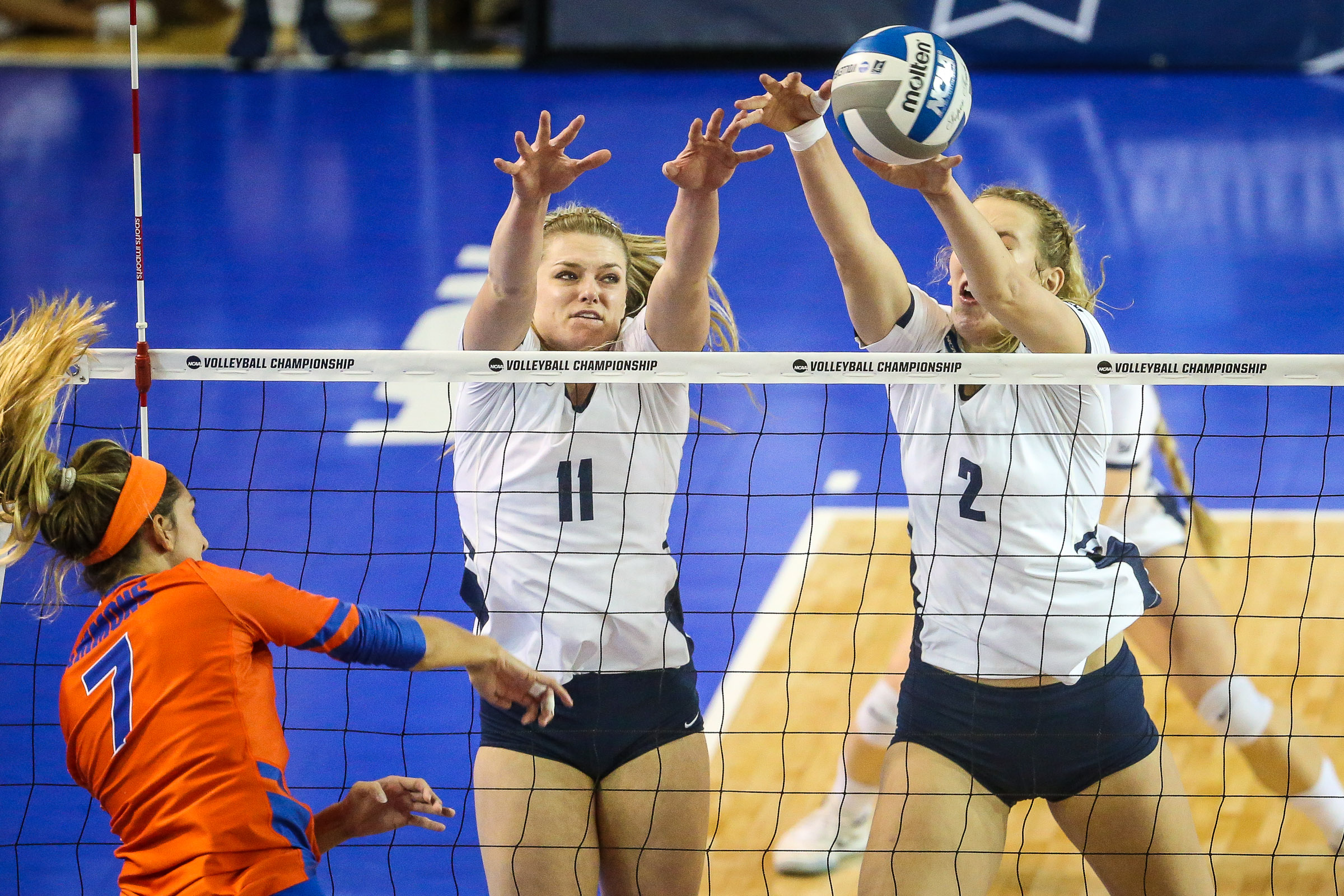 BYU's Lacy Haddock (11) and Heather Gneiting (2) block the ball during BYU's 3-1 win over Florida in an NCAA region semifinal, Friday, Dec. 7, 2018 in Provo. (Photo: Qiling Wang, Deseret News)
