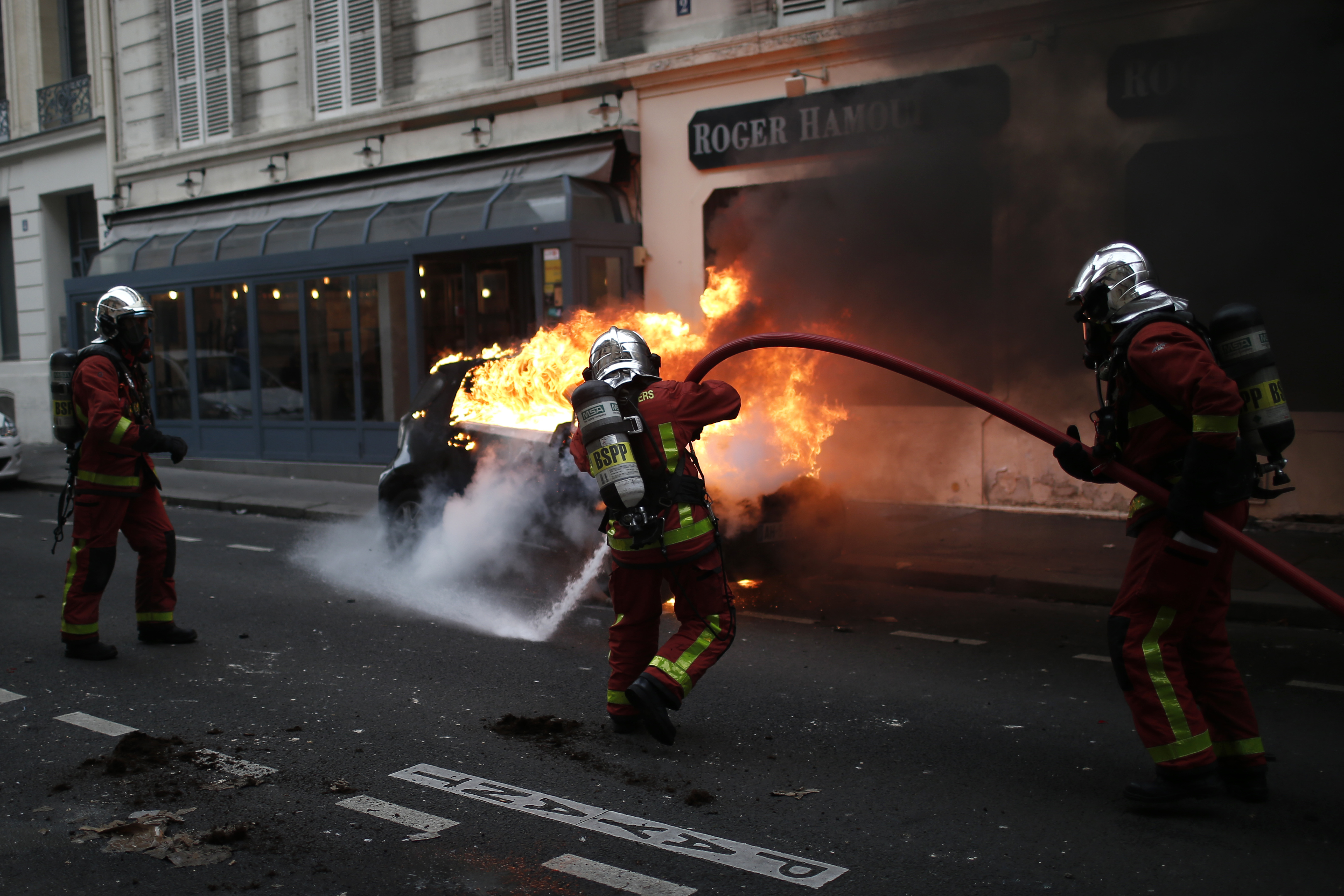 Paris under siege: Tear gas, fury on the Champs-Elysees