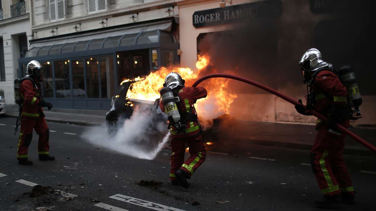 Paris under siege: Tear gas, fury on the Champs-Elysees