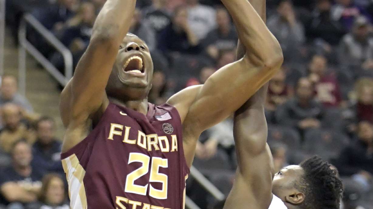 Mann scores 20 as No. 11 Florida State beats UConn 79-71
